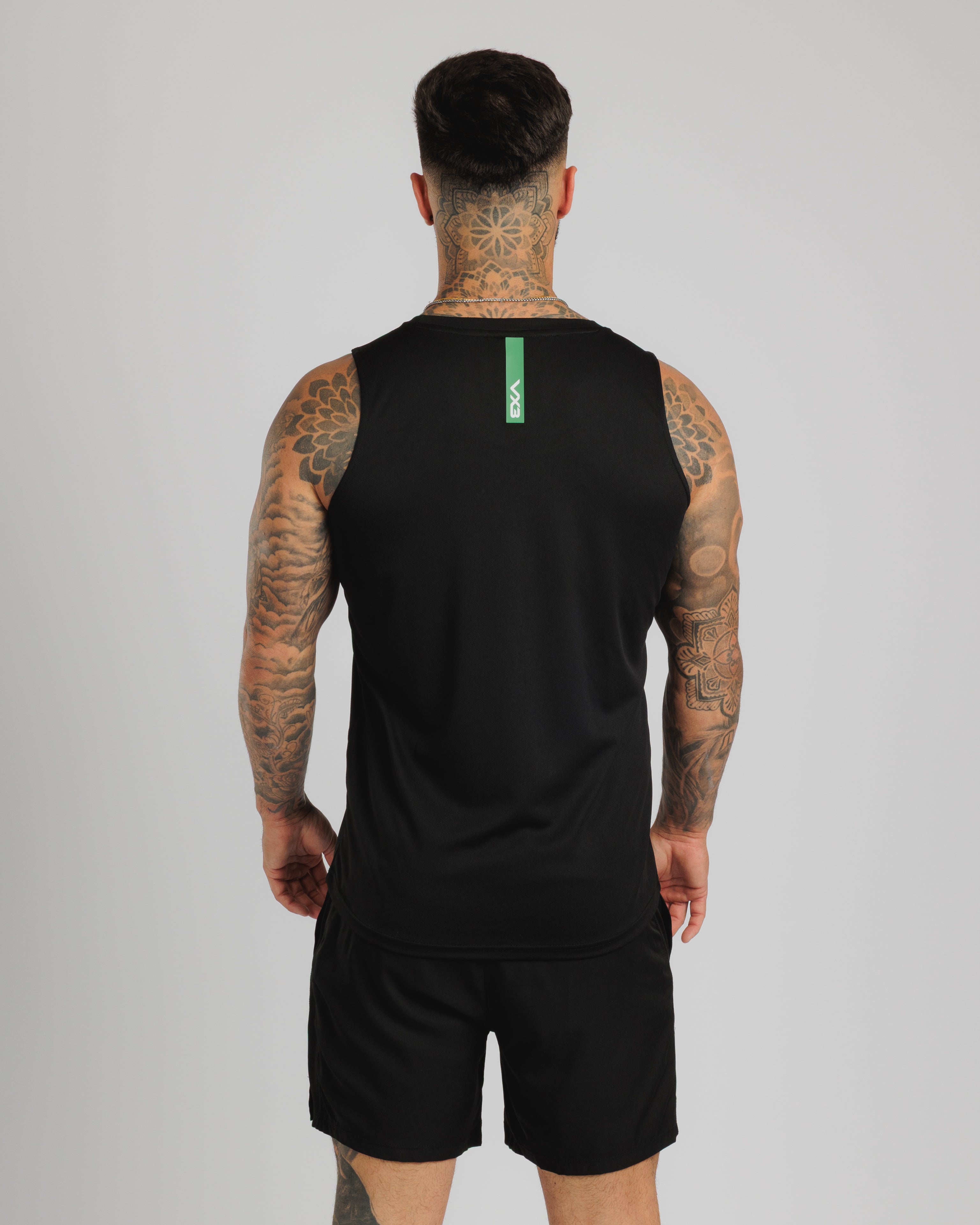 Fortis Vest Black/Emerald