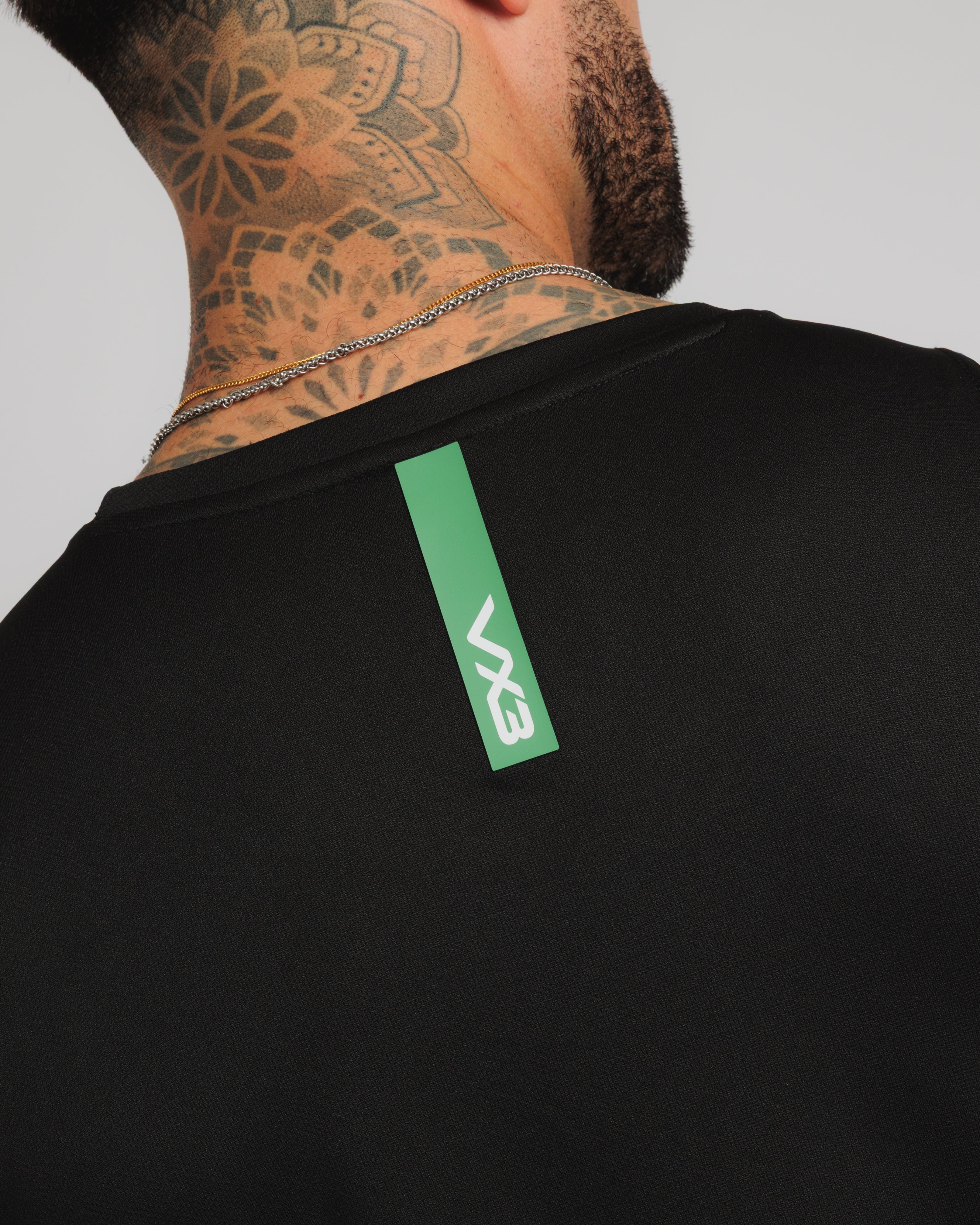 Fortis Vest Black/Emerald