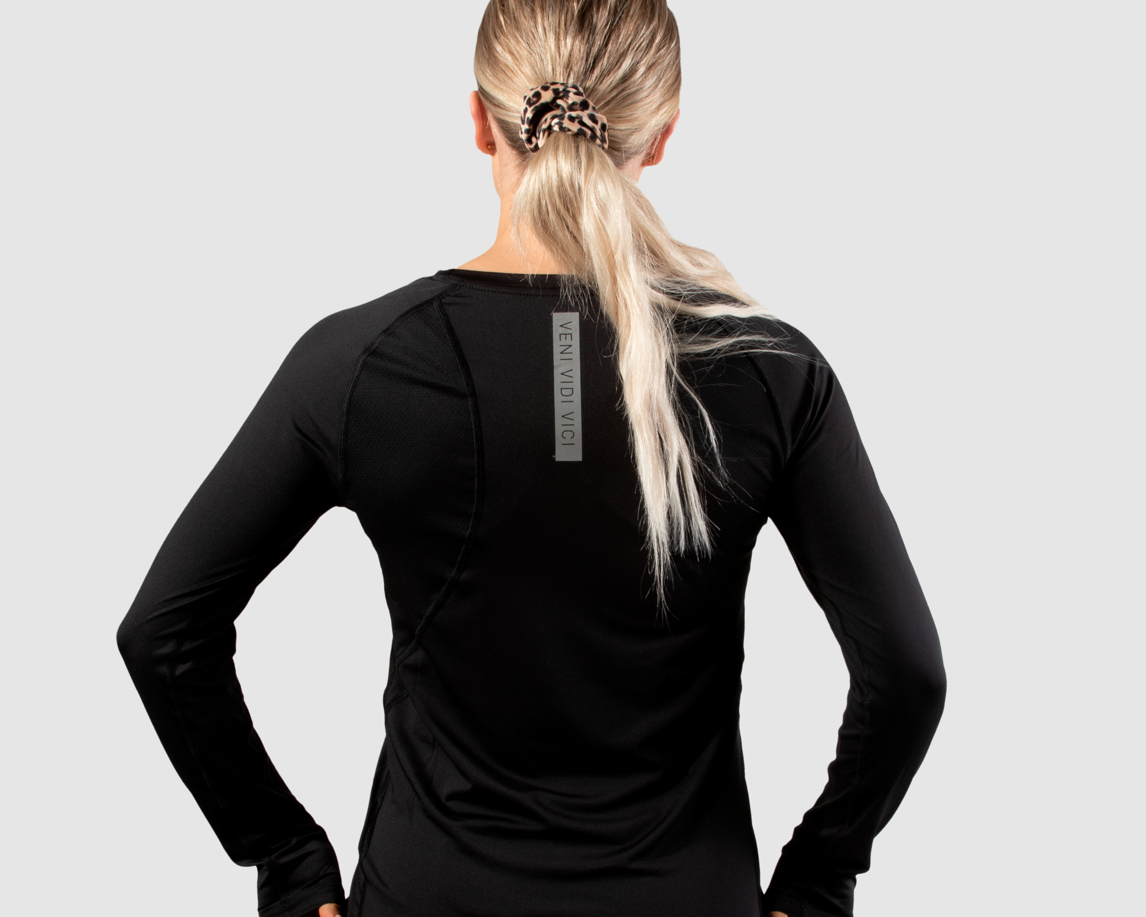 Motus-Ladies-Training-Tee-LS-Black-alt1.png