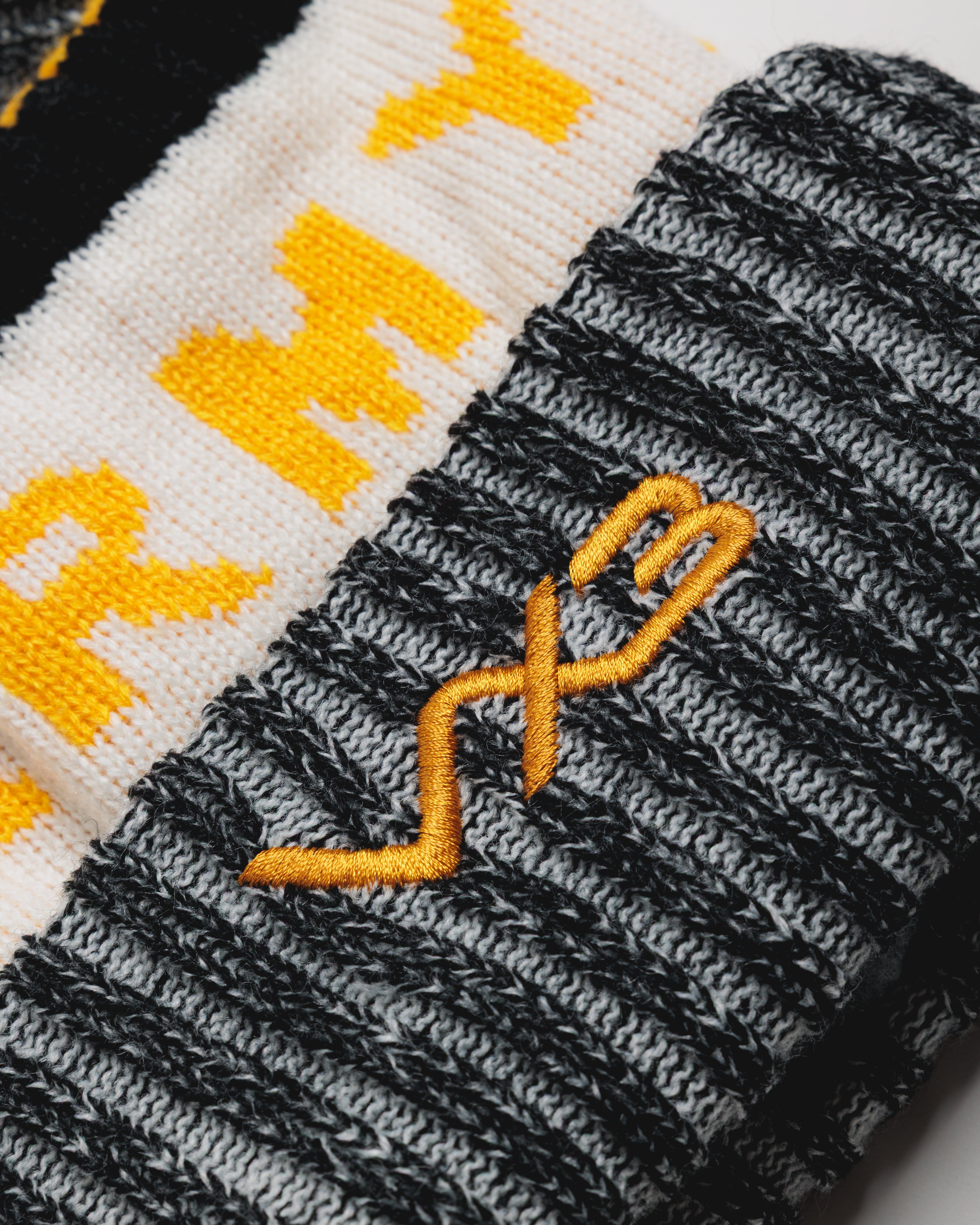 Newport County AFC 24/25 Bobble Hat- Black/White/Amber