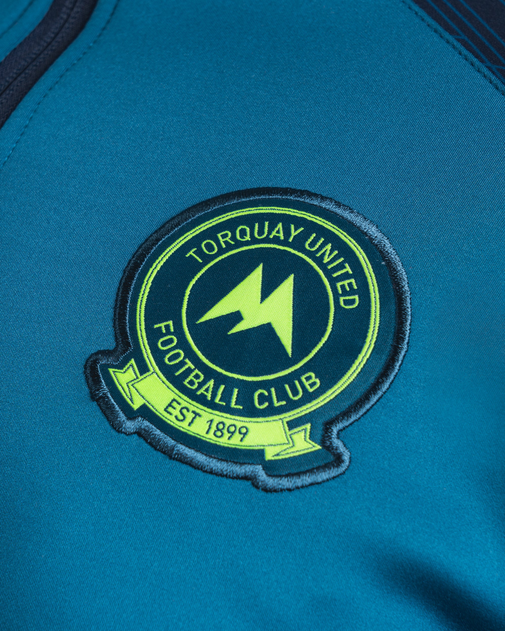 Torquay United FC 25/26 Vertex Half Zip Top Youth Lyons Blue/Navy/Fluro Yellow