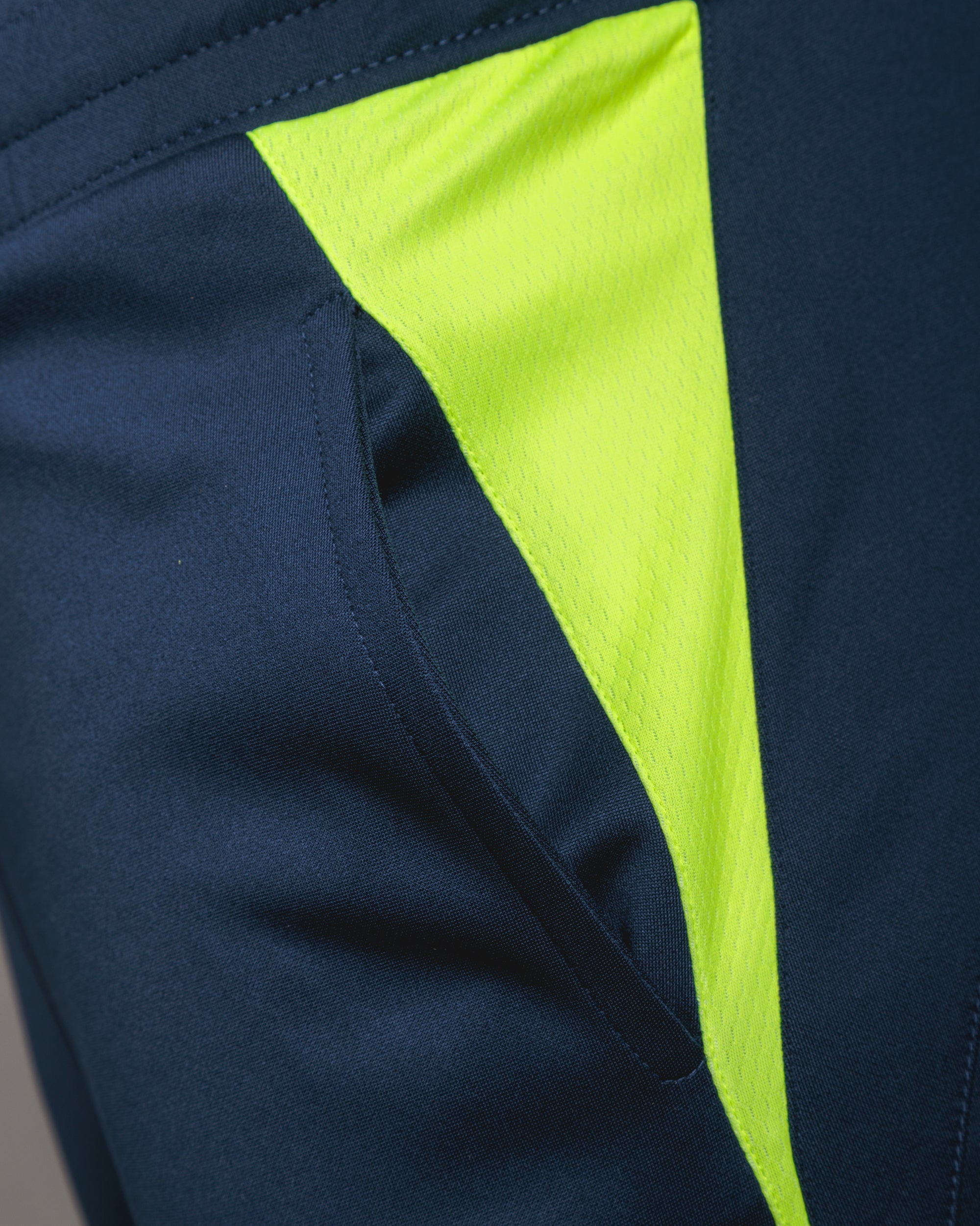 Torquay United FC 25/26 Vertex Skinny Pants Youth Navy/Fluro Yellow