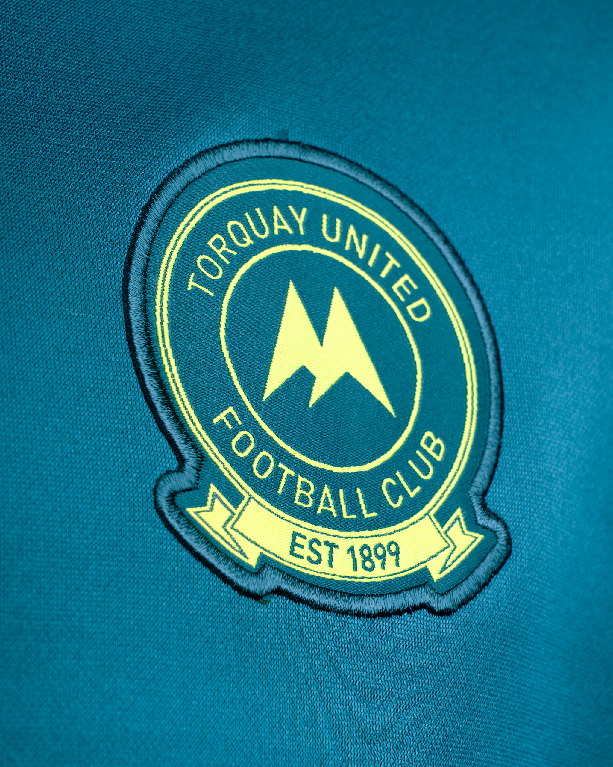Torquay United FC 25/26 Vertex Training Hoodie Youth Lyons Blue/Navy/Fluro Yellow