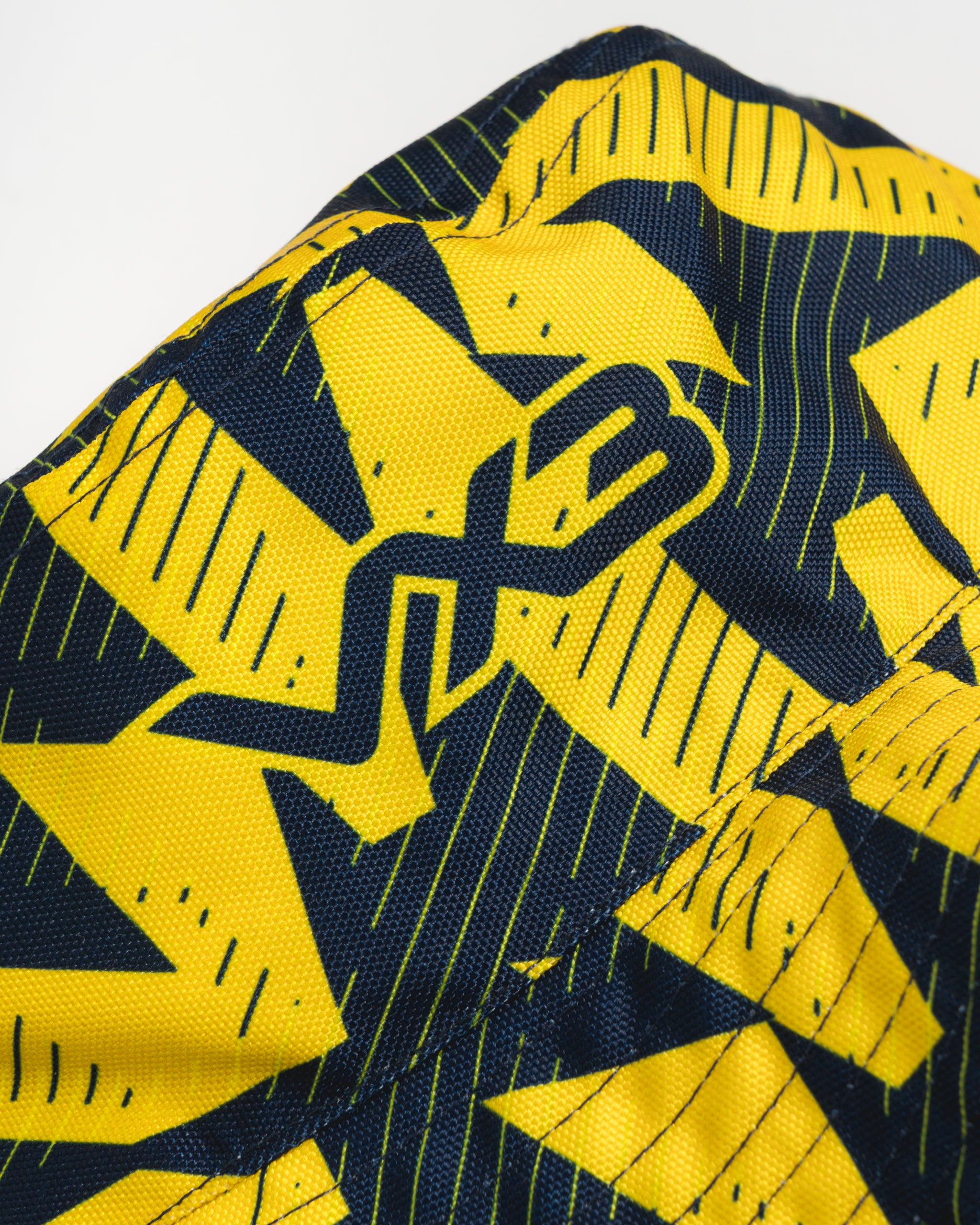 Torquay United FC 25/26  Reversible Bucket Hat White/Cool Grey/Yellow