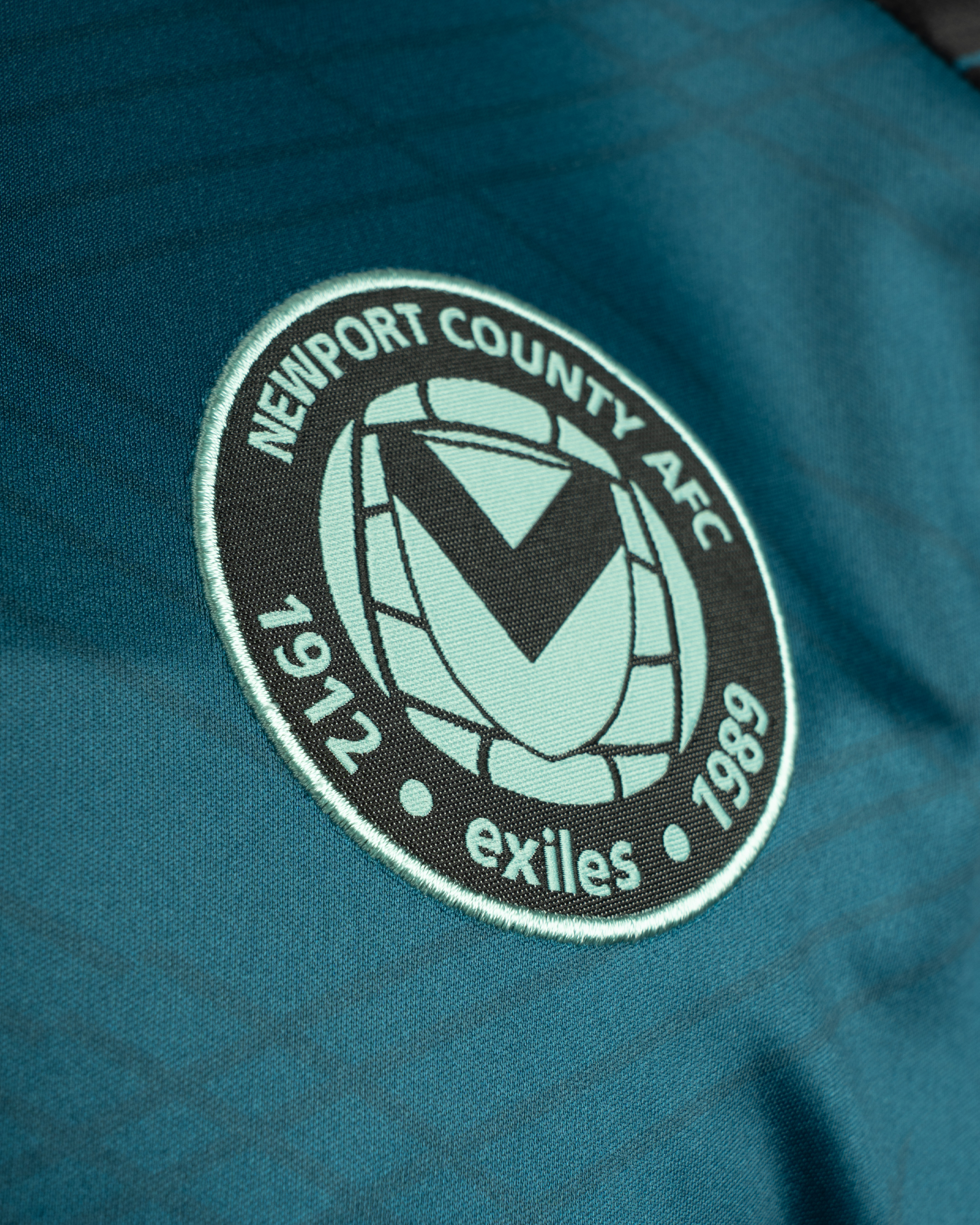 Newport County AFC 25/26 Vertex Training Tee Blue Coral/Black