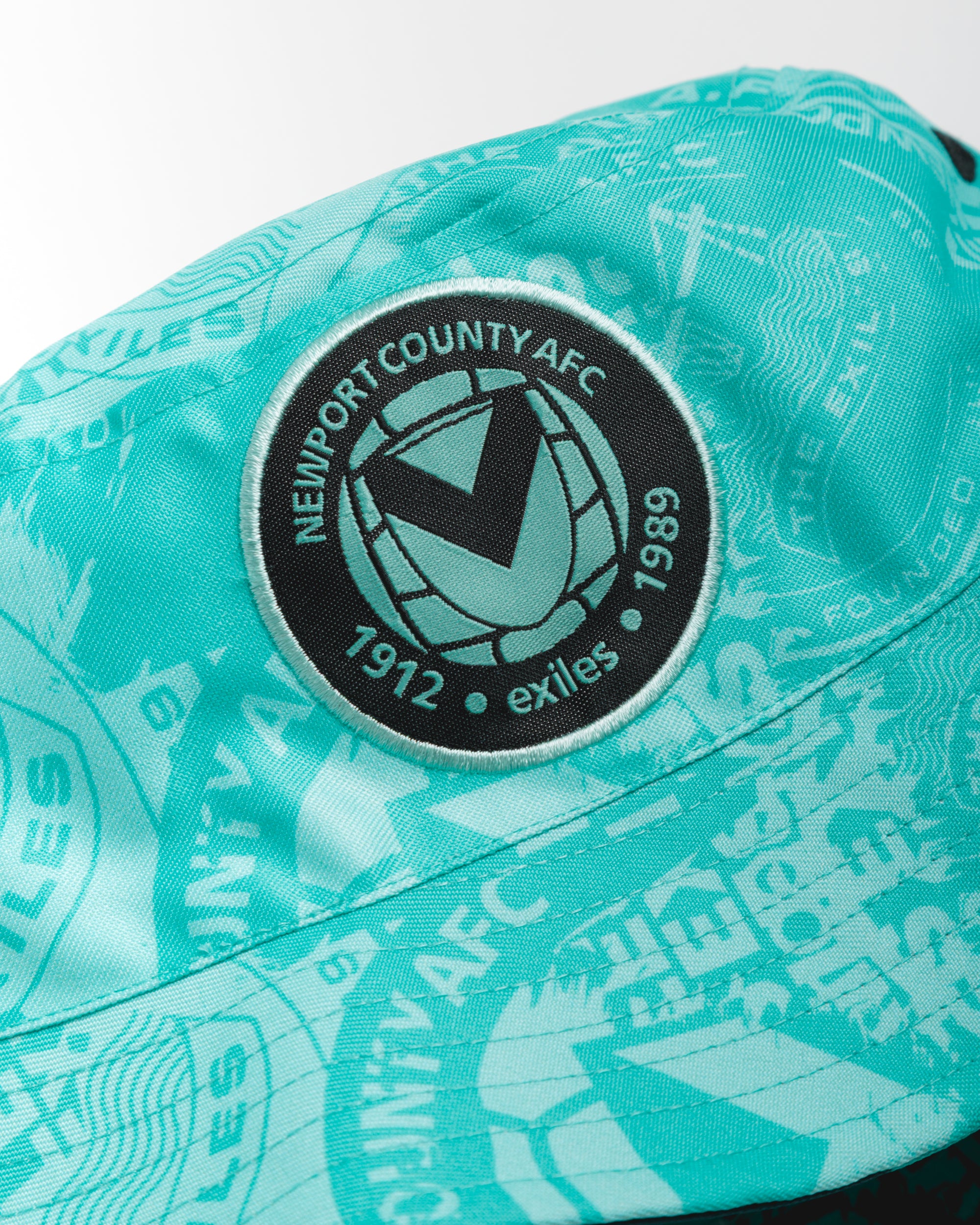 Newport County AFC 25/26  Reversible Bucket Hat	Aruba/Blue Coral