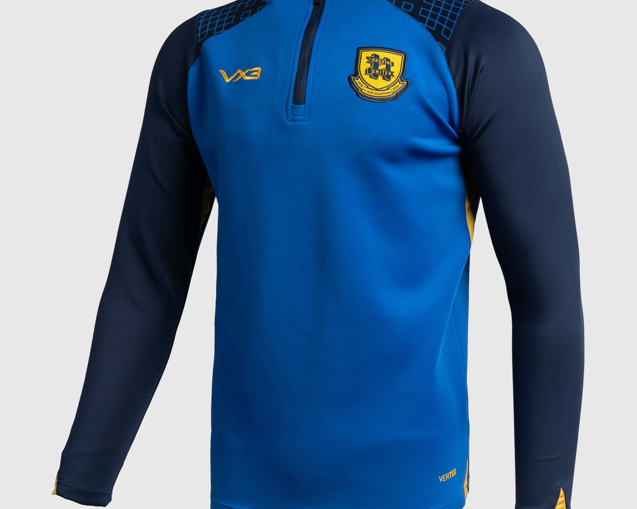 P82311-HASHTAG-UNITED-25-26-VERTEX-HALF-ZIP-TOP-ROYAL-NAVY-AMBER-ELECTRIC-BLUE.png