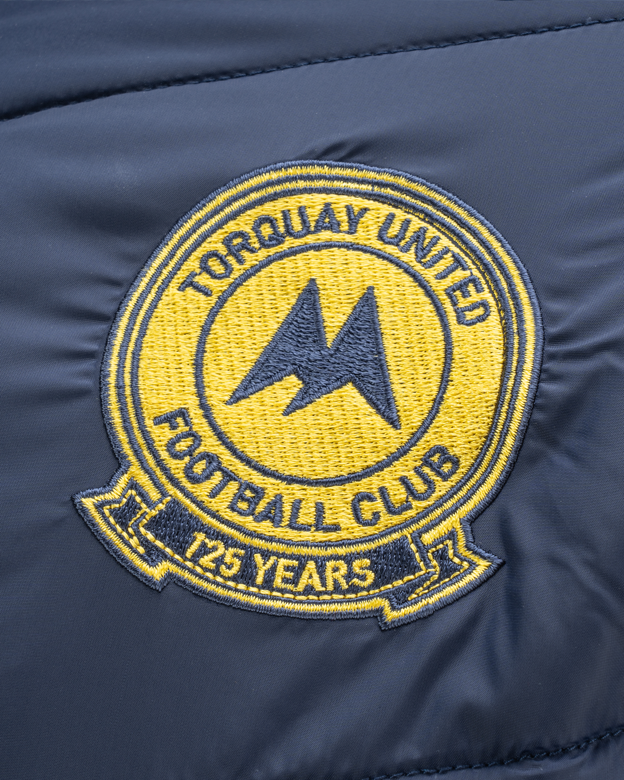 Torquay United FC 24/25 Tempest Hybrid Jacket Navy
