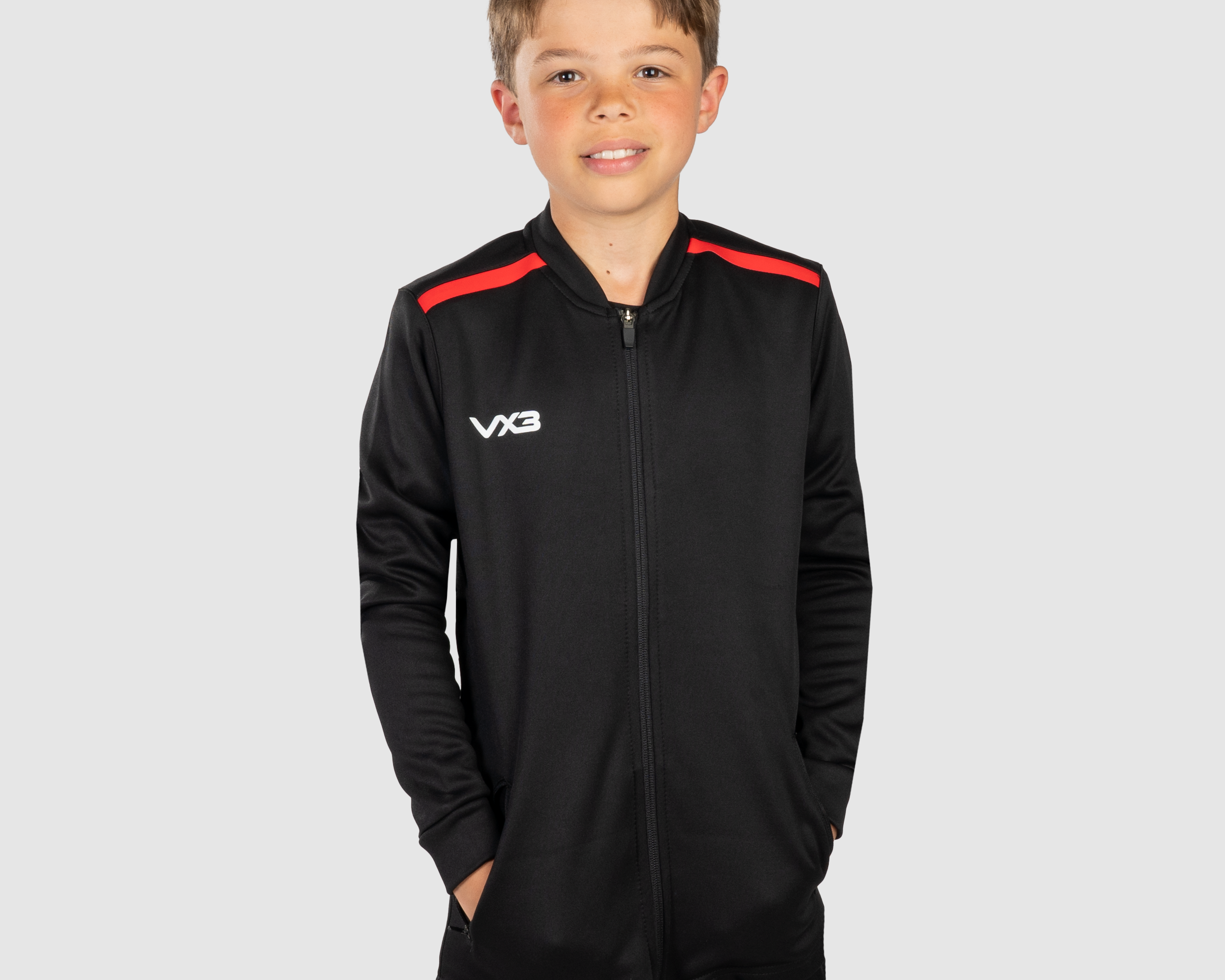 YouthFortisPresJacketBlackRedFront.png