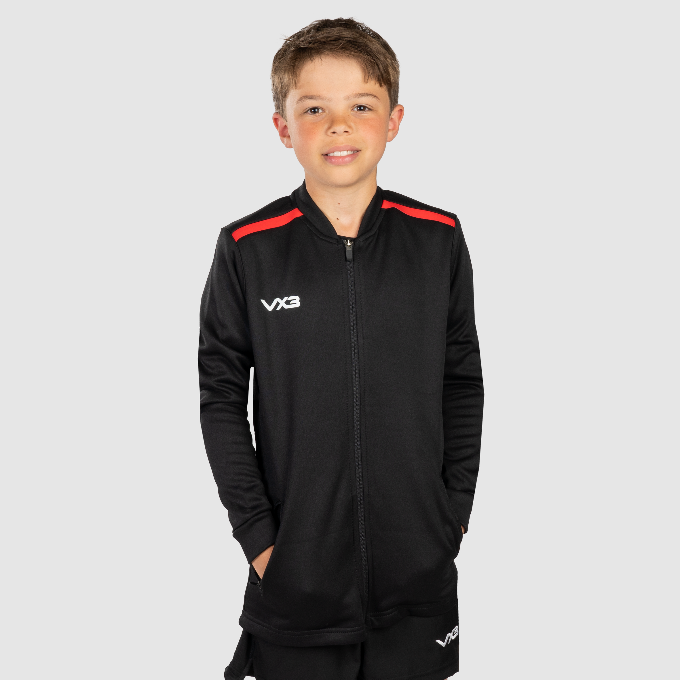 YouthFortisPresJacketBlackRedFront.png