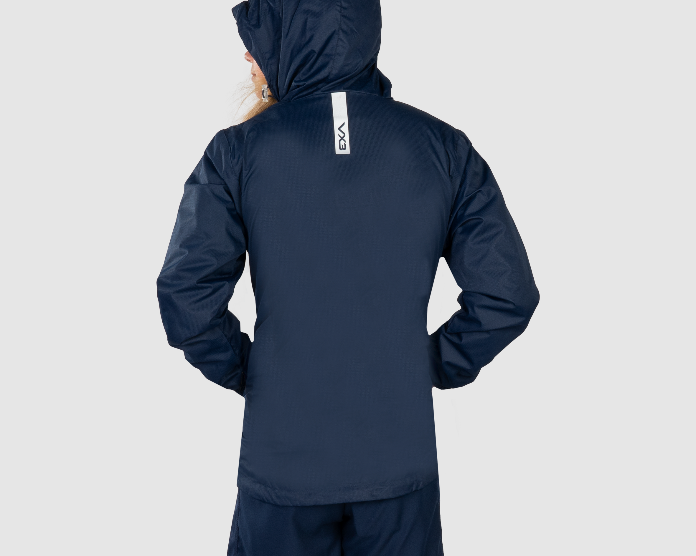 YouthNavyWhiteRainJacketBack.png