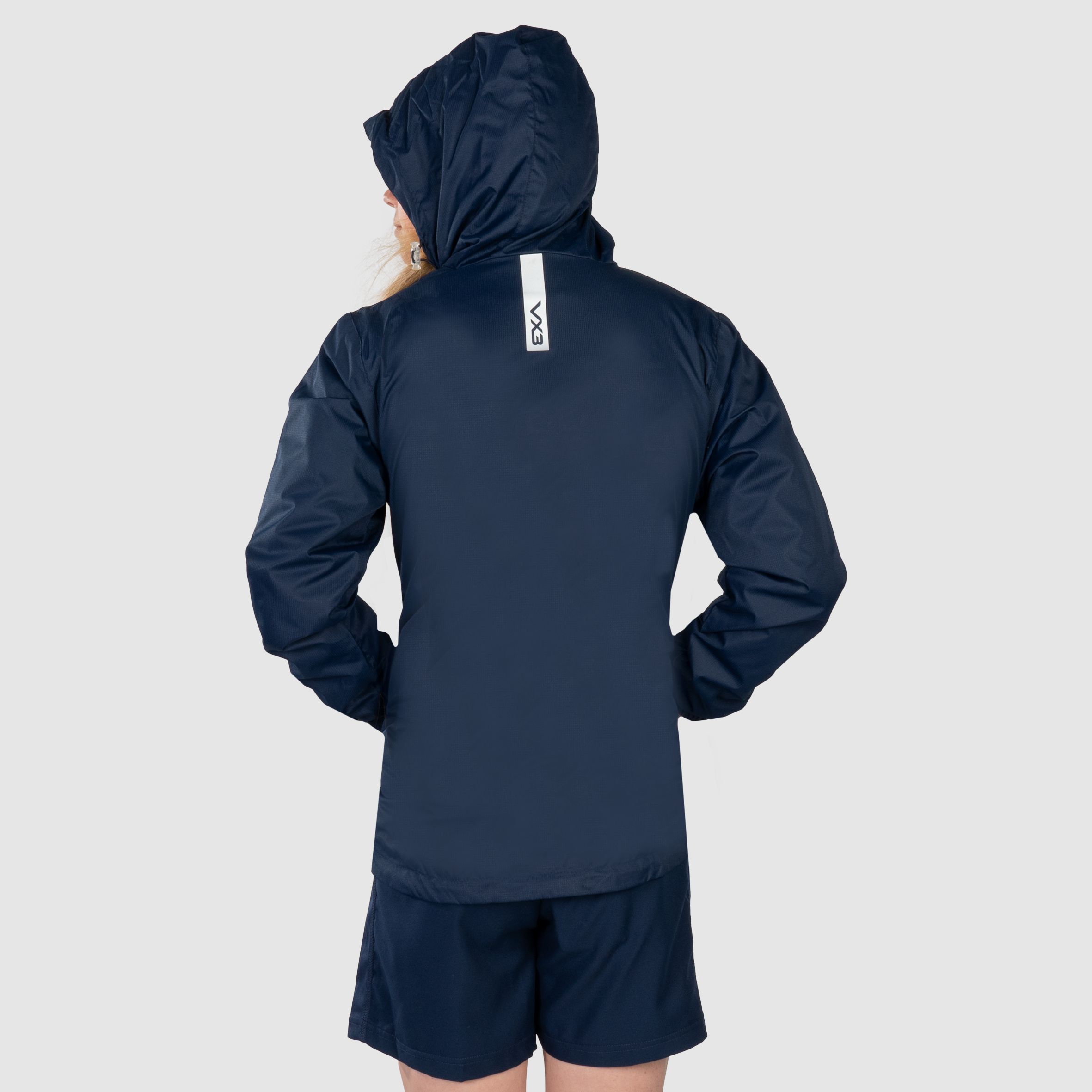 YouthNavyWhiteRainJacketBack.png