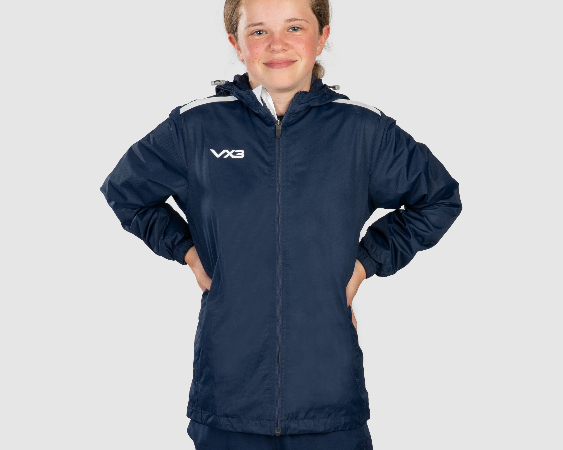 YouthNavyWhiteRainJacketFront.png