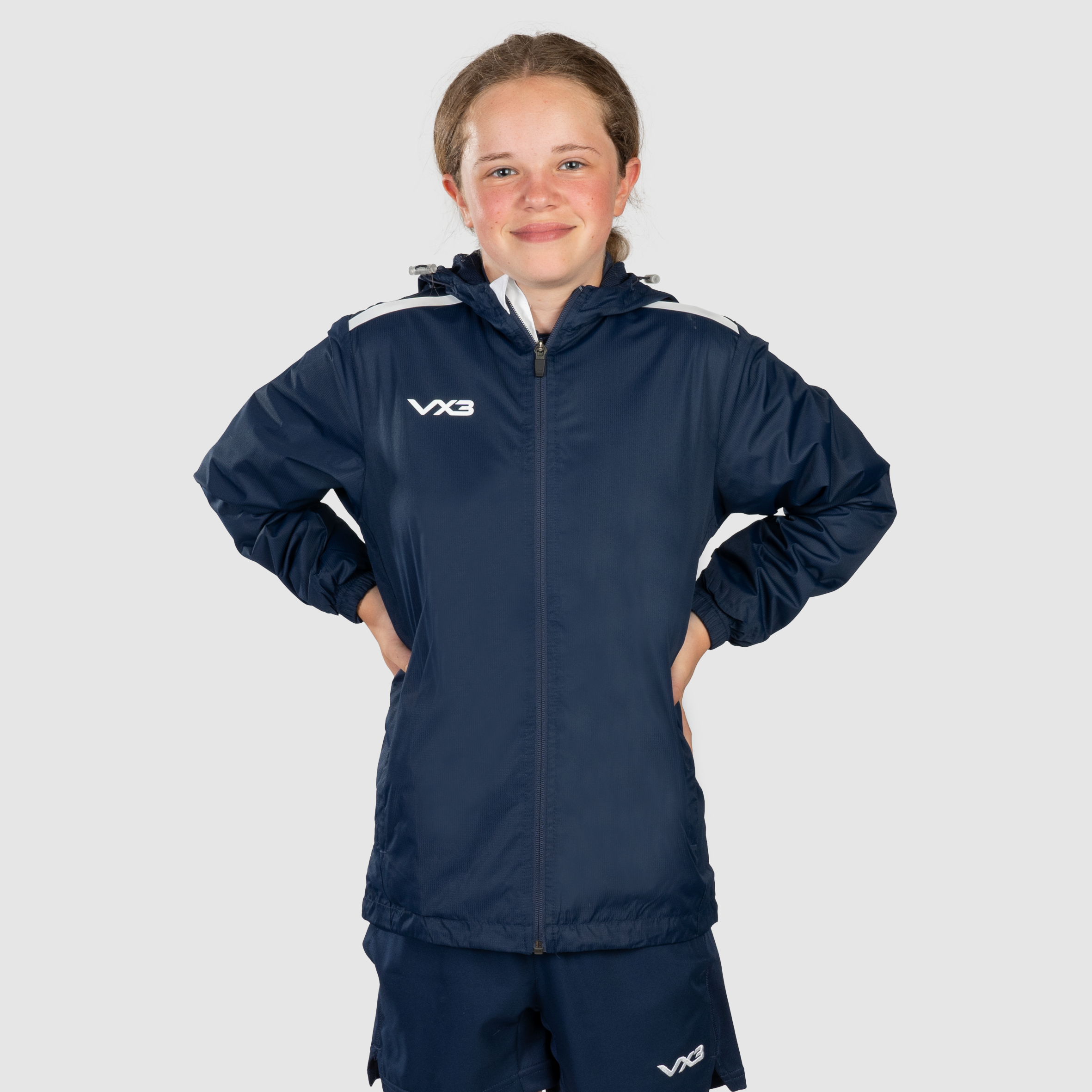 YouthNavyWhiteRainJacketFront.png