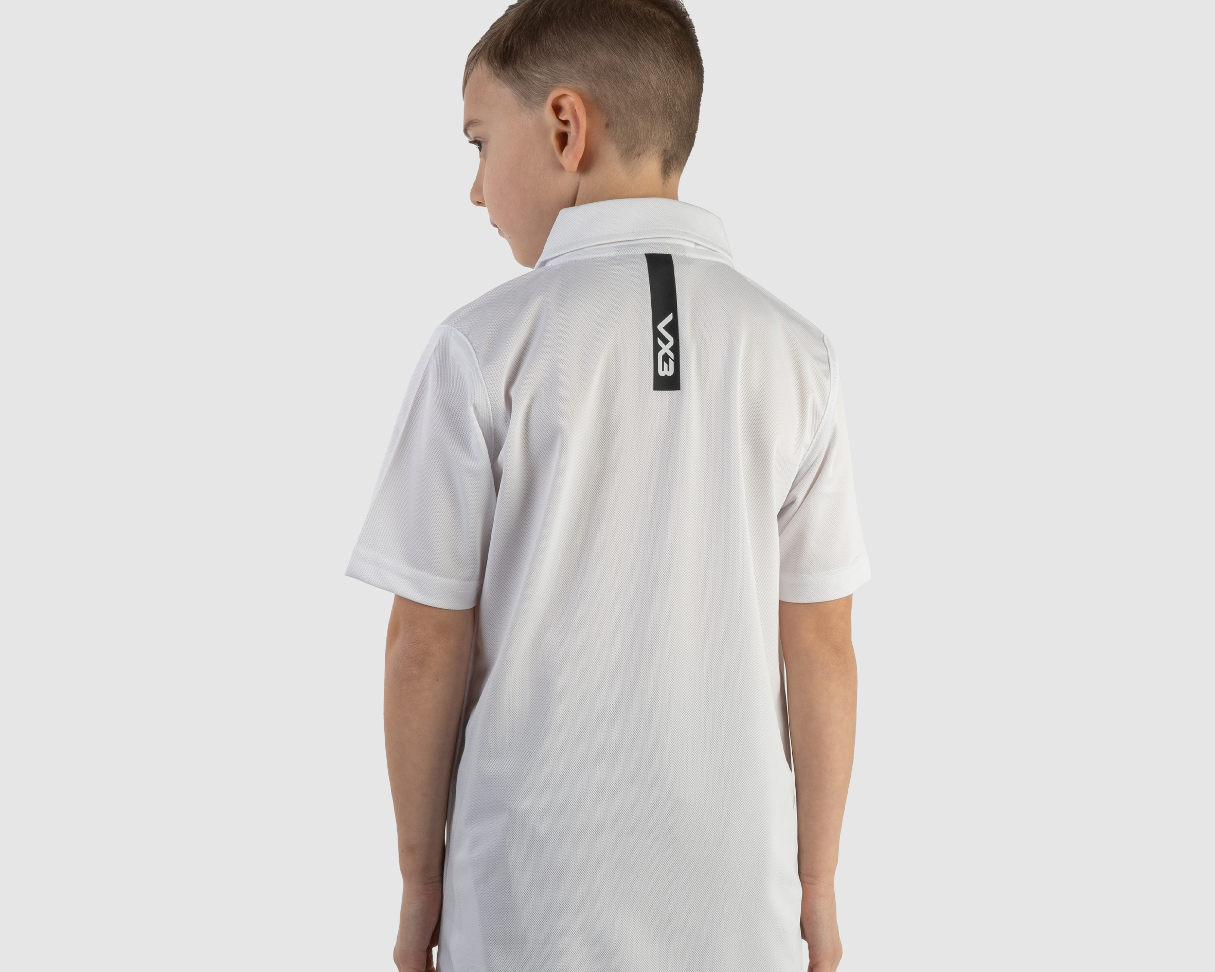 302515-Fortis-Polo-Youth-White-Black-alt1.png