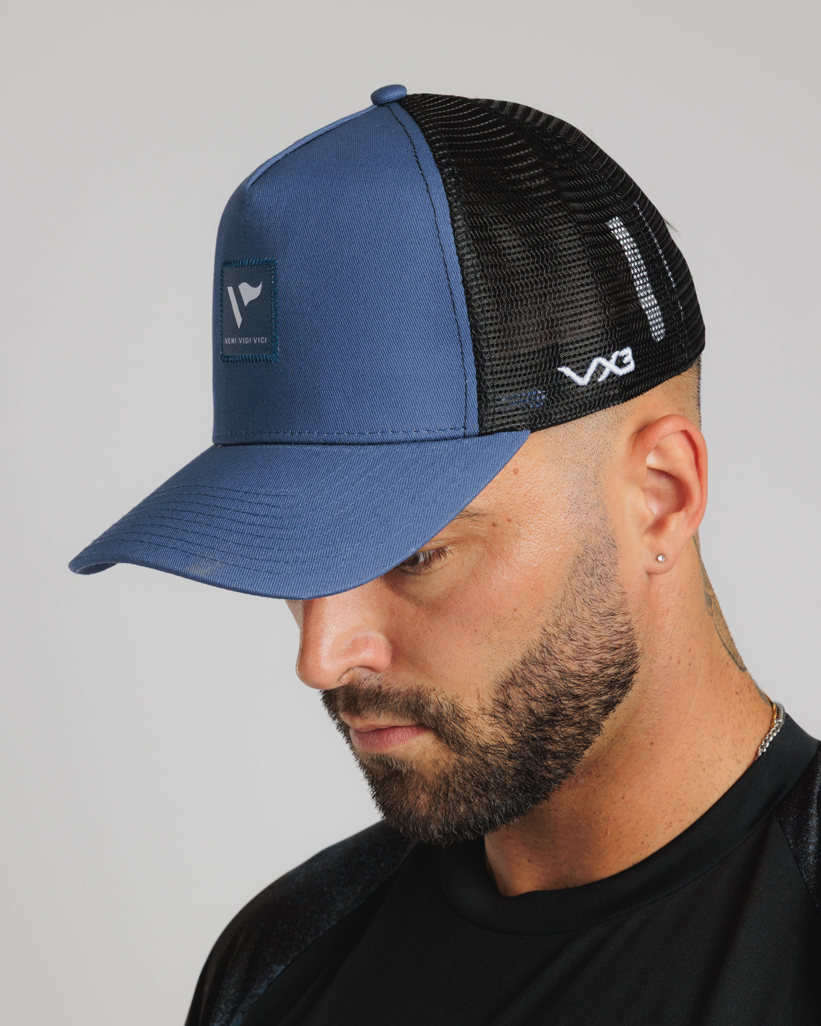 Conquer Trucker Cap