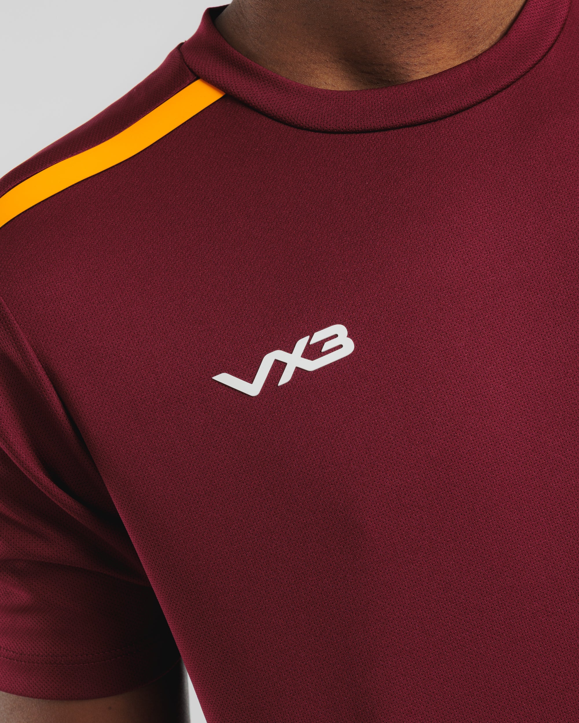 Fortis Tee Maroon/Amber