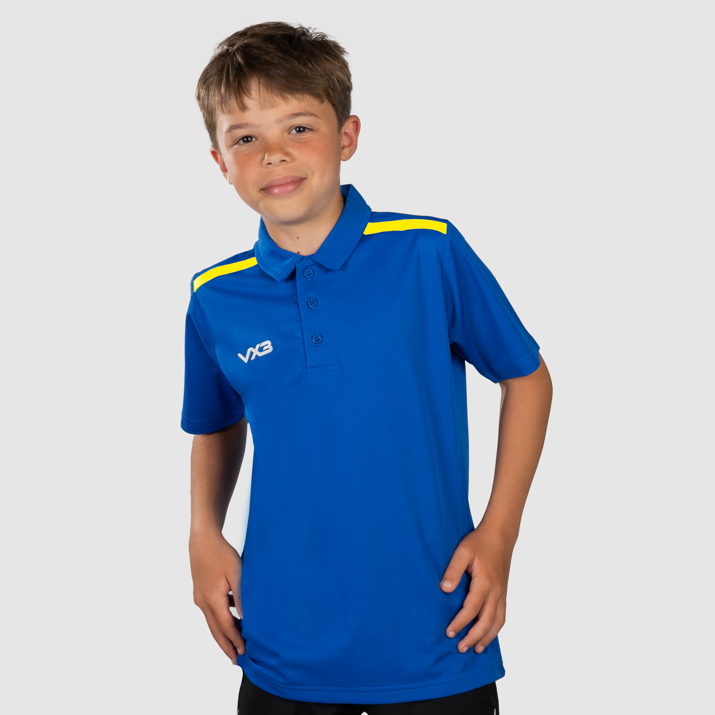 FortisYouthPoloRoyal_YellowFront.png