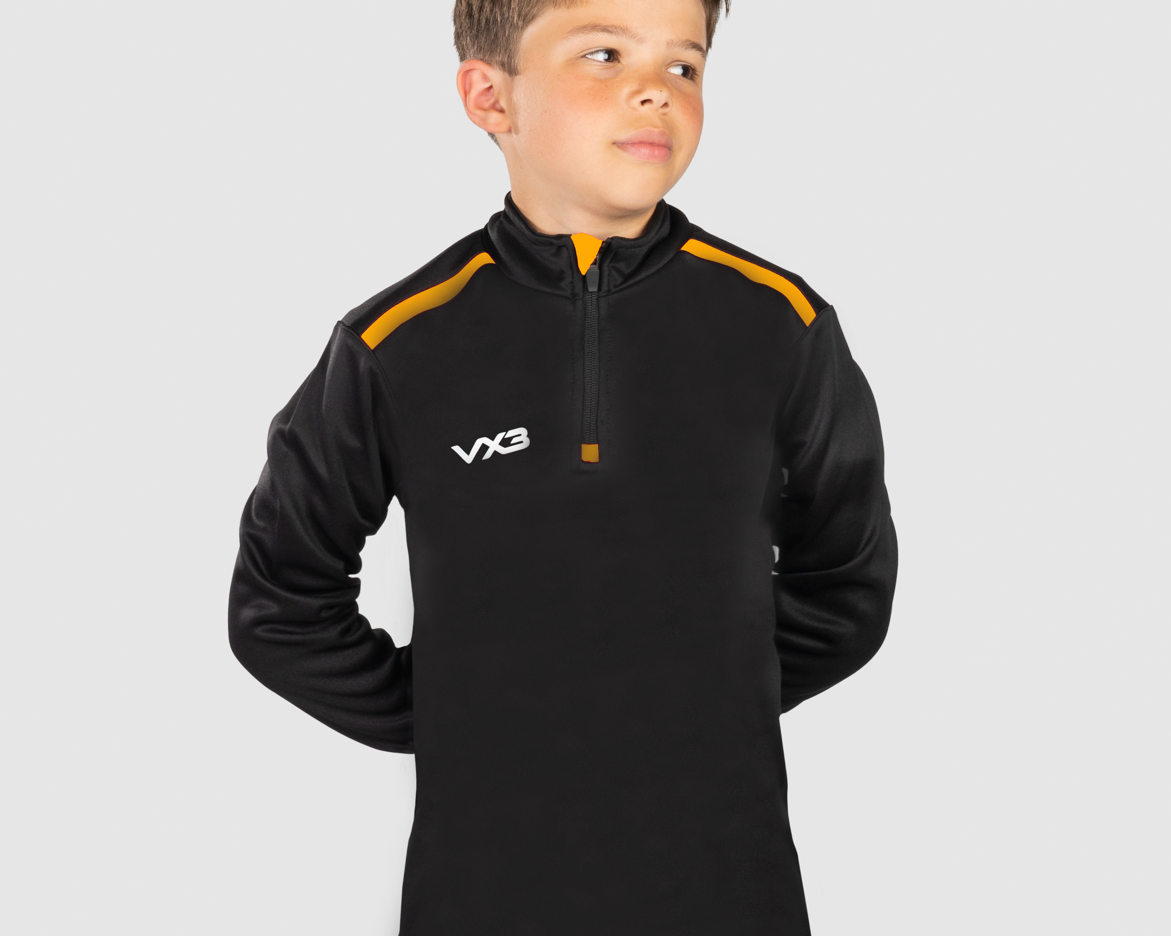 FortisYouthQuarterZipSweatBlack_AmberFront.png