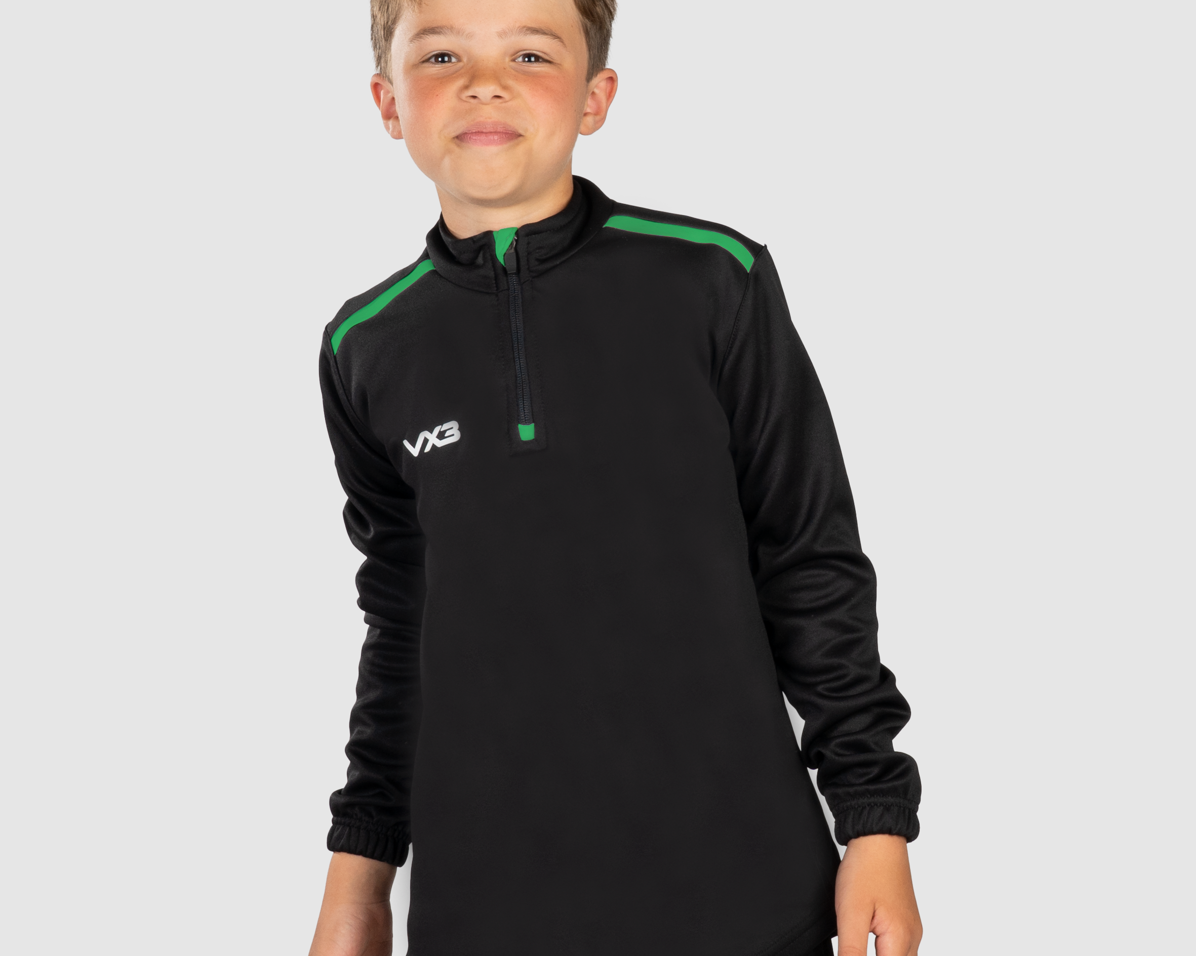 FortisYouthQuarterZipSweatBlack_EmeraldFront.png
