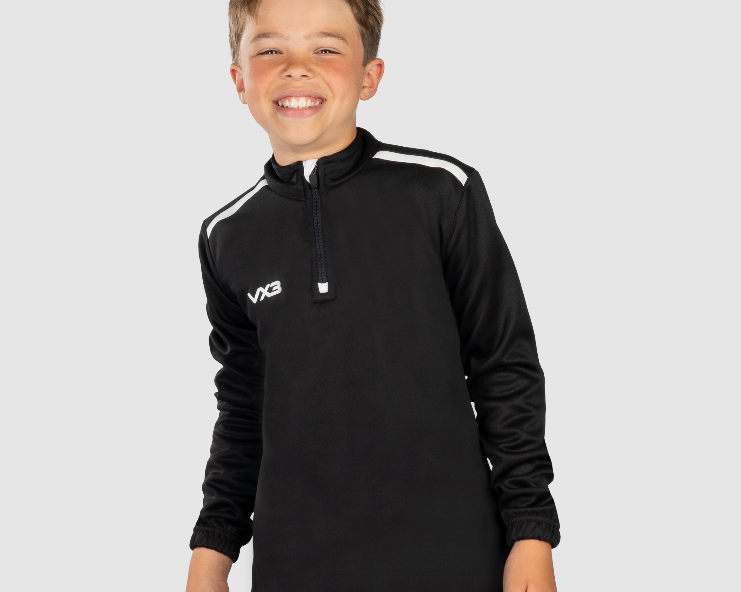 FortisYouthQuarterZipSweatBlack_WhiteFront.png