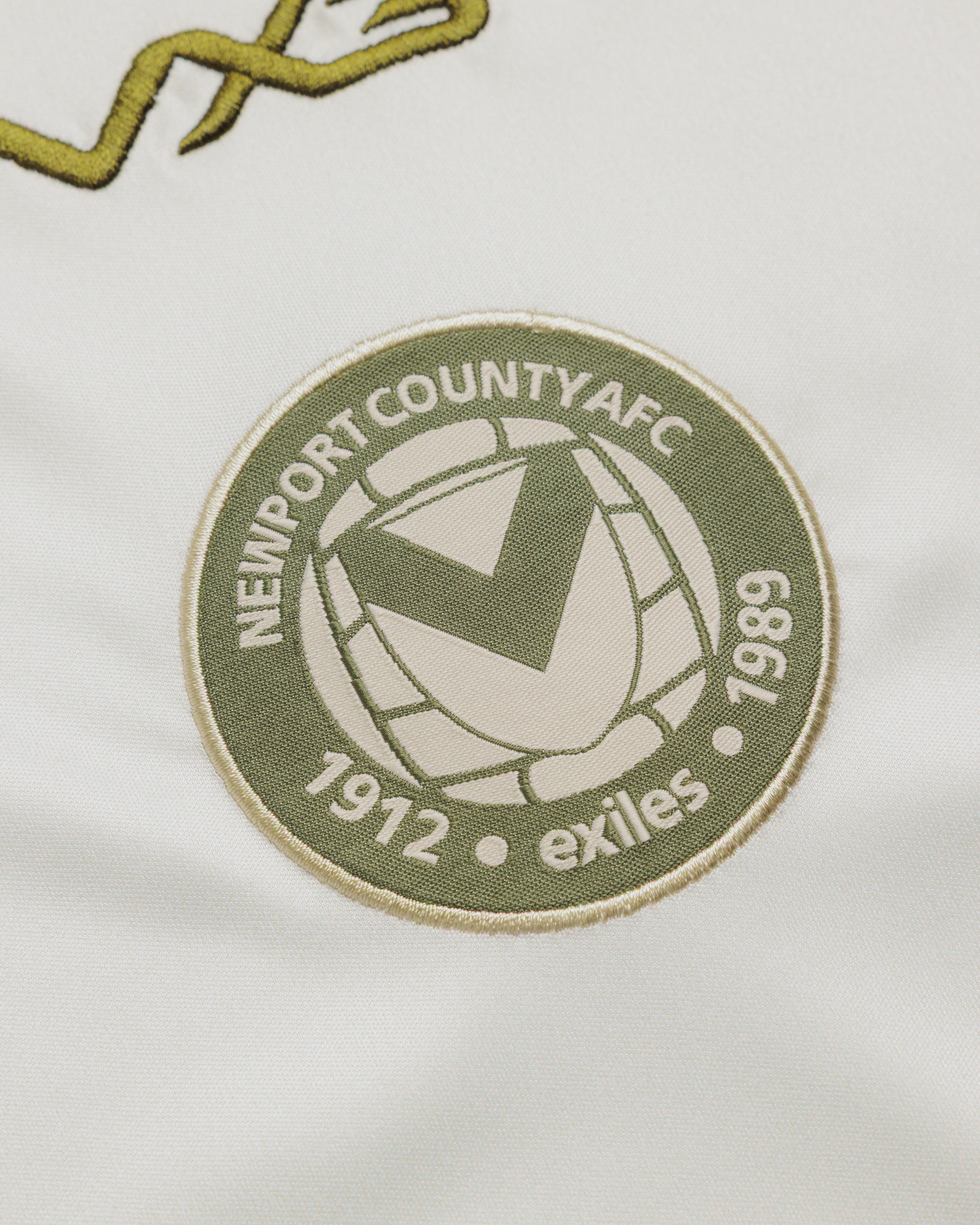 Newport County AFC 26/27 Vertex Training Tee Youth Ecru/Dark Olive