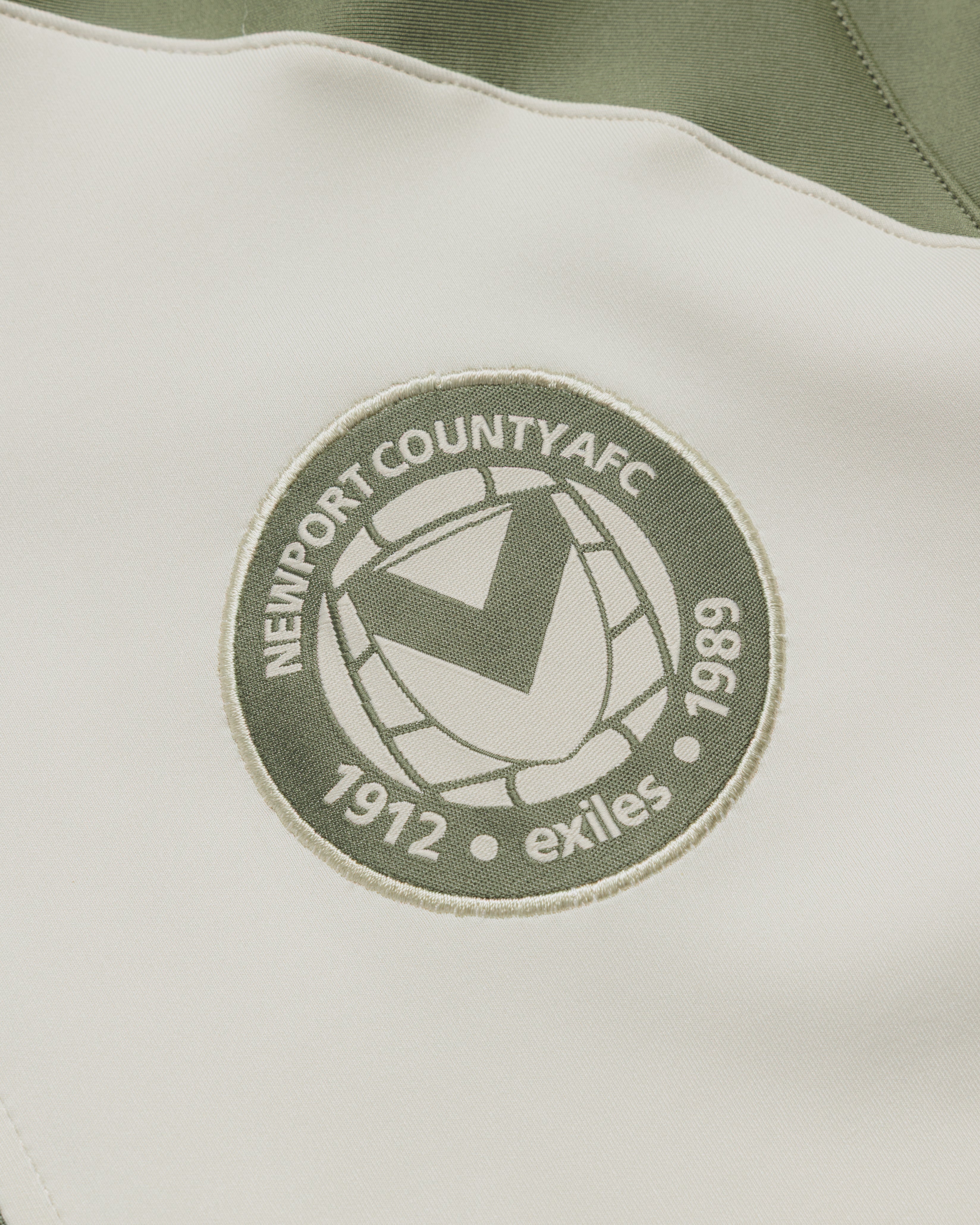 Newport County AFC 26/27 Vertex Half Zip Top Ecru/Dark Olive