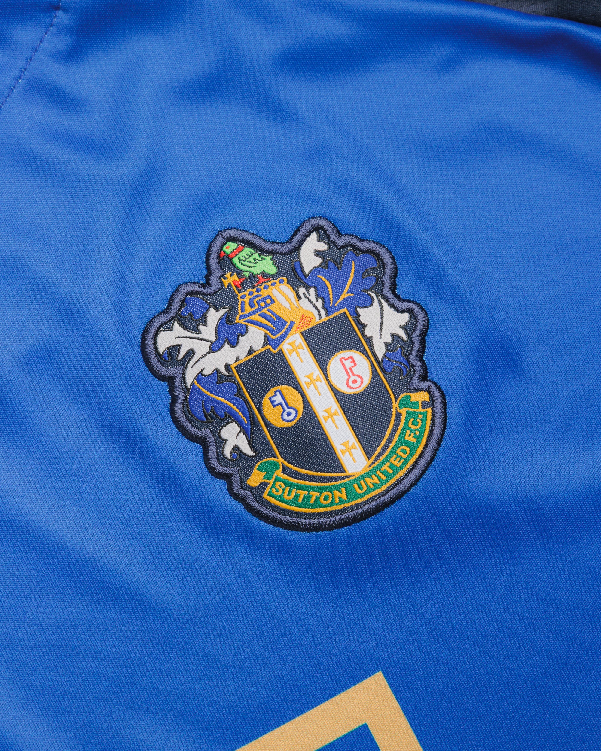 Sutton United 26/27 Vertex Training Tee Royal/Navy/Gold