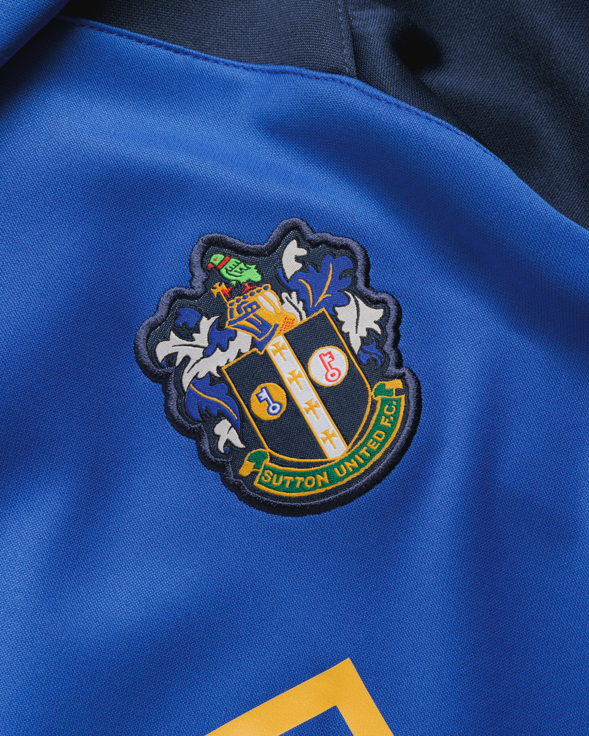 Sutton United 26/27 Vertex Training Hoodie Youth Royal/Navy/Gold