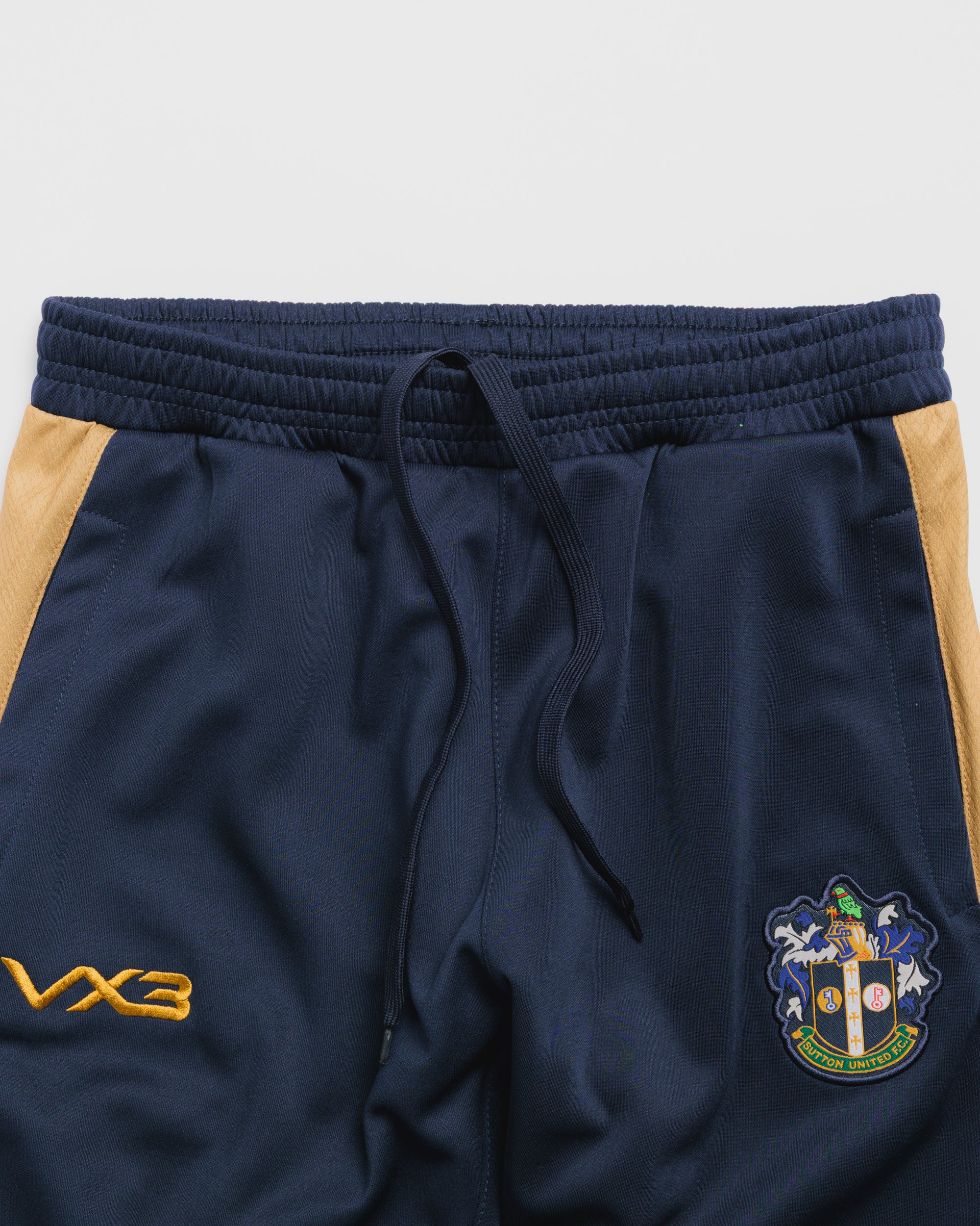 Sutton United 26/27 Vertex Skinny Pants Youth Navy/Gold