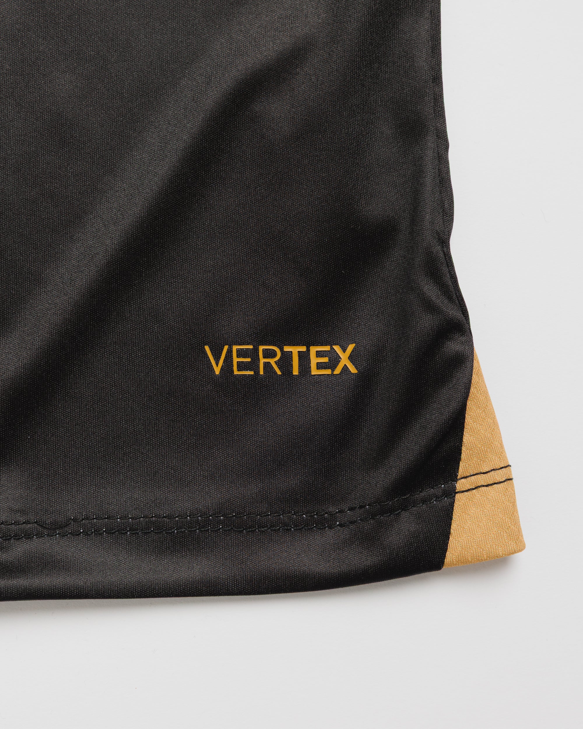 Sutton United 26/27 Vertex Training Tee Black/Dark Grey/Gold