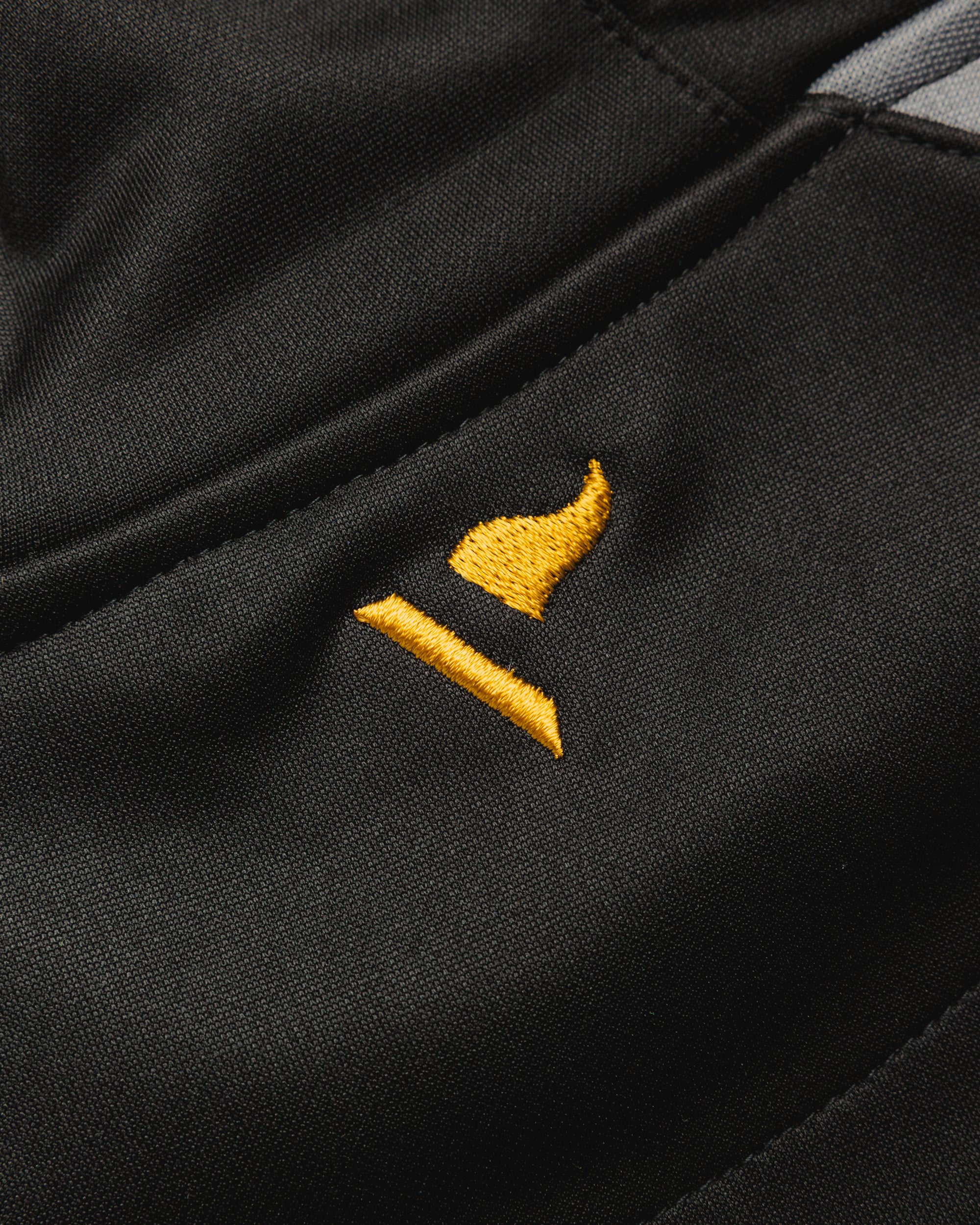 Sutton United 26/27 Vertex Training Hoodie Black/Dark Grey/Gold