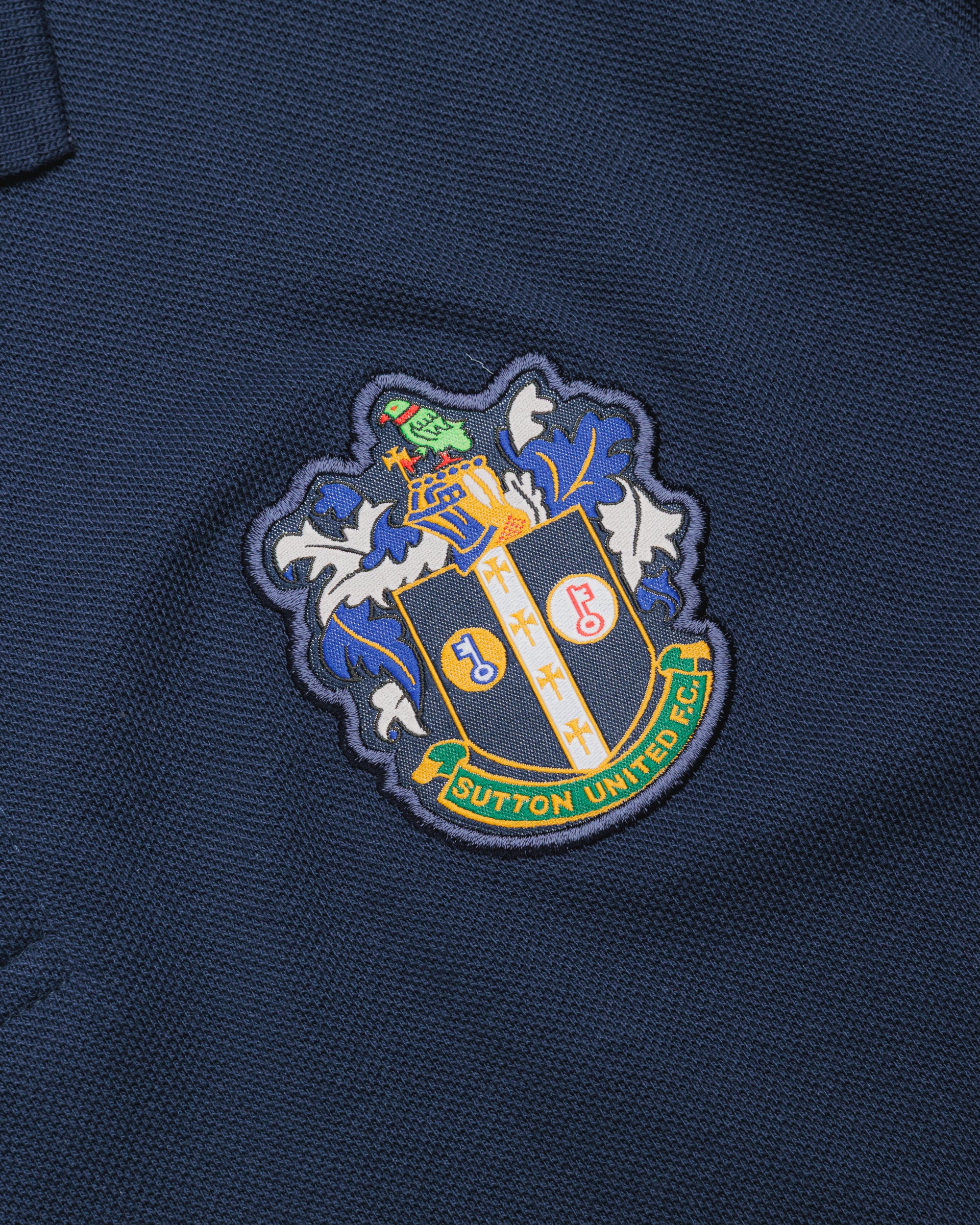 Sutton United 26/27 Vertex Polo Shirt Navy