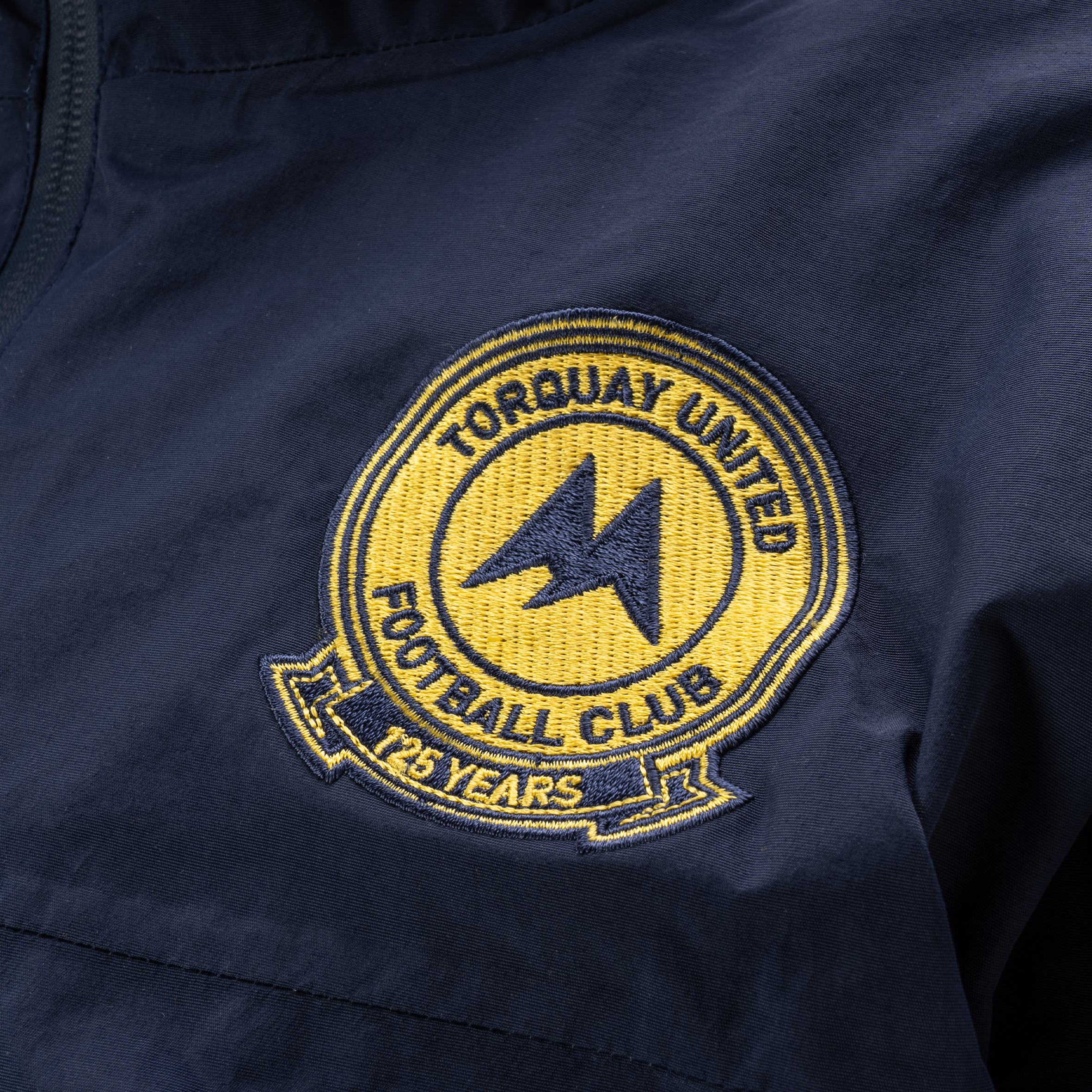 Torquay United FC 24/25 Waterproof Protego Jacket Navy