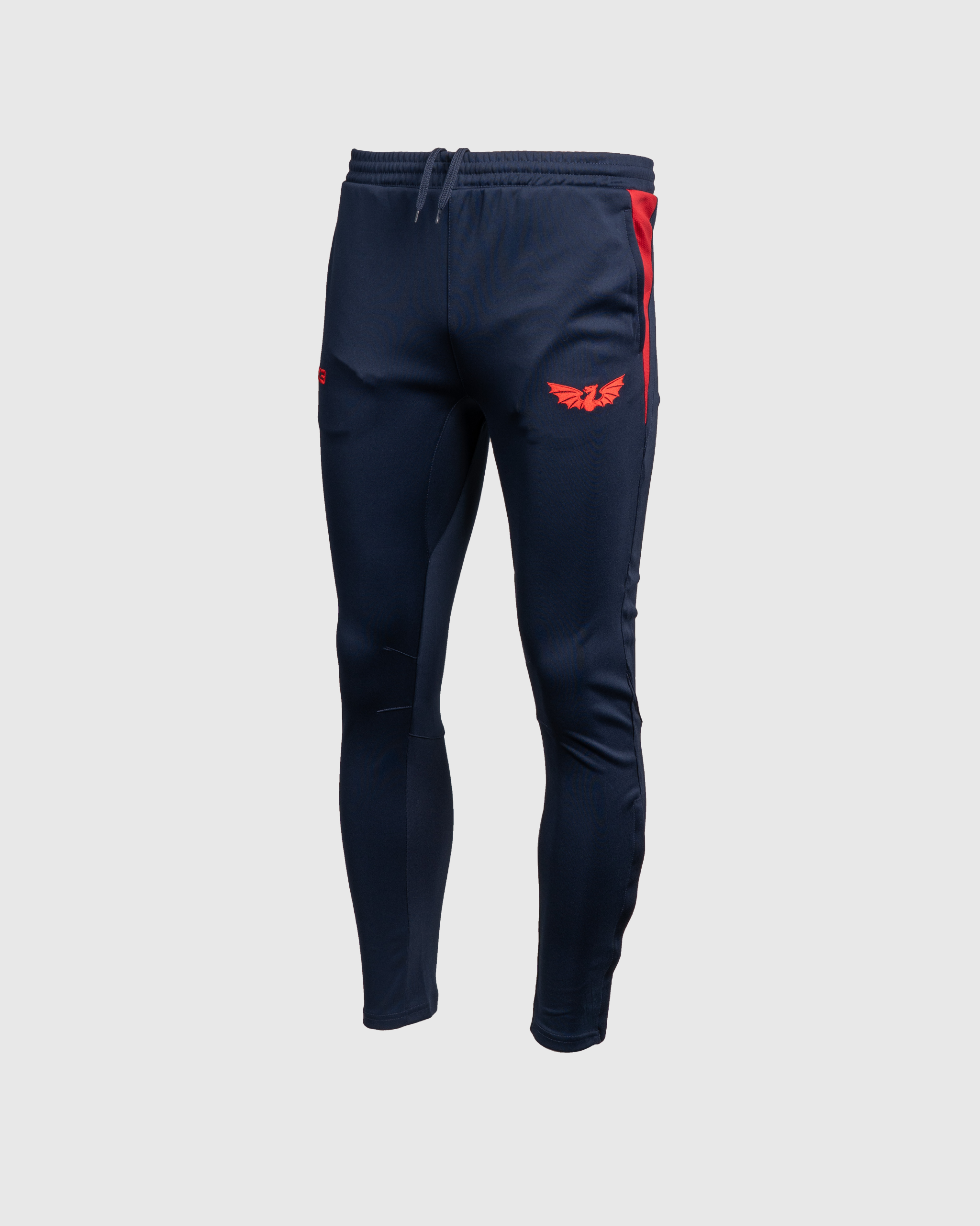 P75312-SCARLETS-25-26-VERTEX-SKINNY-PANTS-NAVY-BRIGHT-RED.png