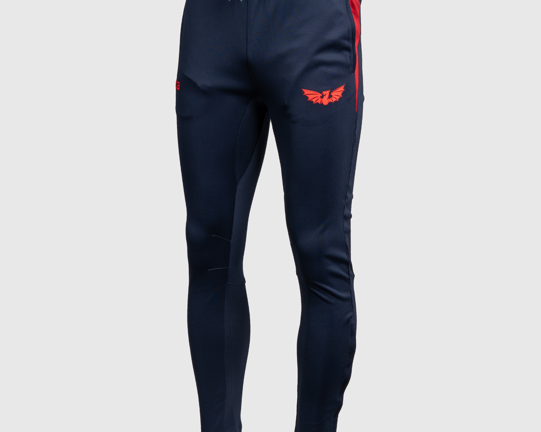 P75312-SCARLETS-25-26-VERTEX-SKINNY-PANTS-NAVY-BRIGHT-RED_5cb31137-3e63-4180-b6a5-02bff4abd138.png