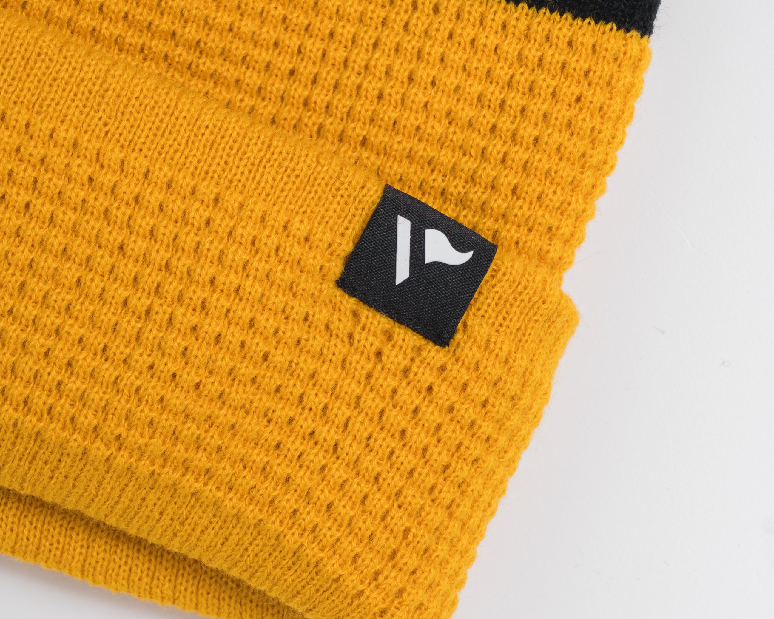 P83974WaffleKnitBobbleHat-Amber-Black-White-2.jpg