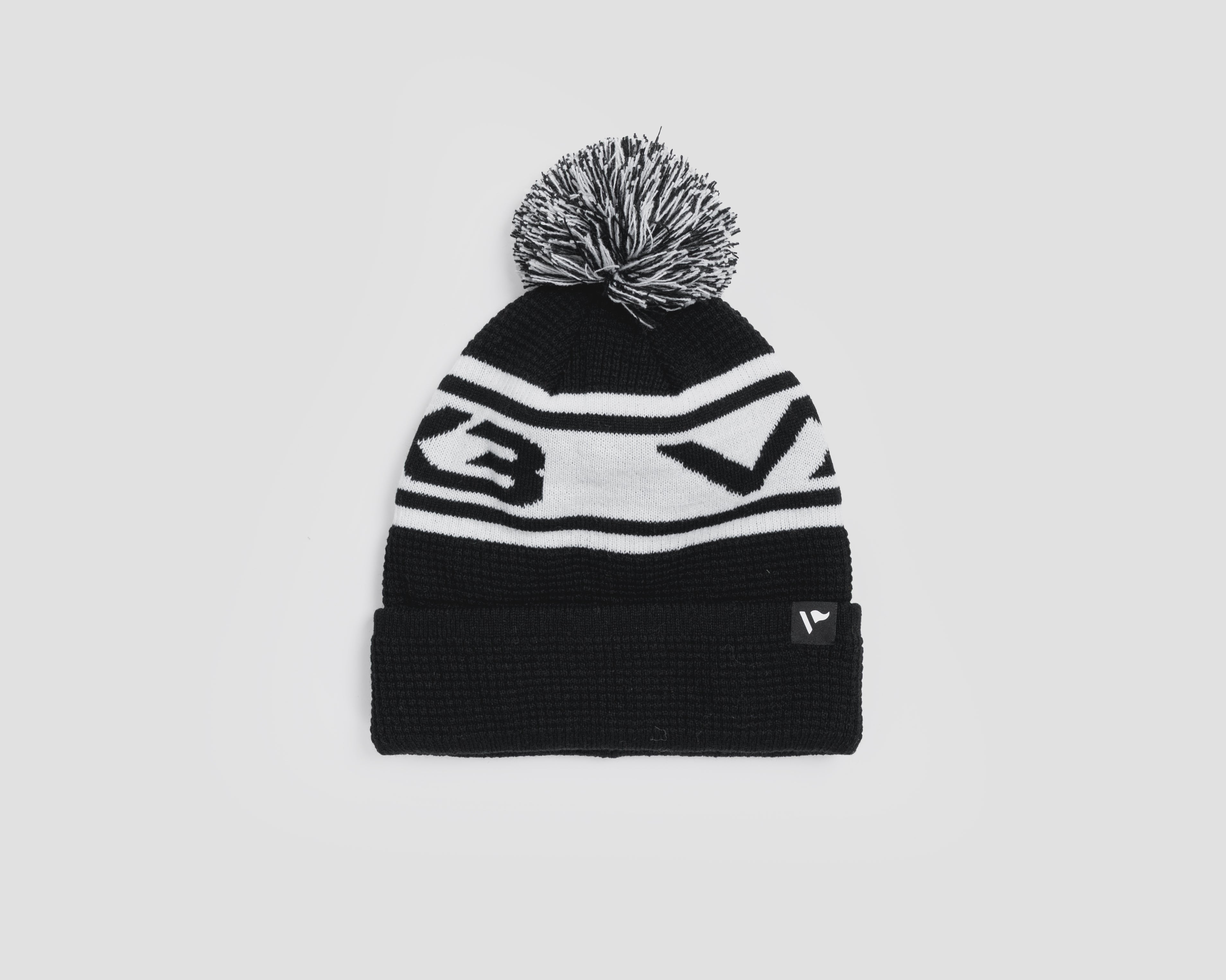 P83986WaffleKnitBobbleHat-Black-White-1_d96cc1c1-76f8-4343-980e-de92fba105f9.jpg