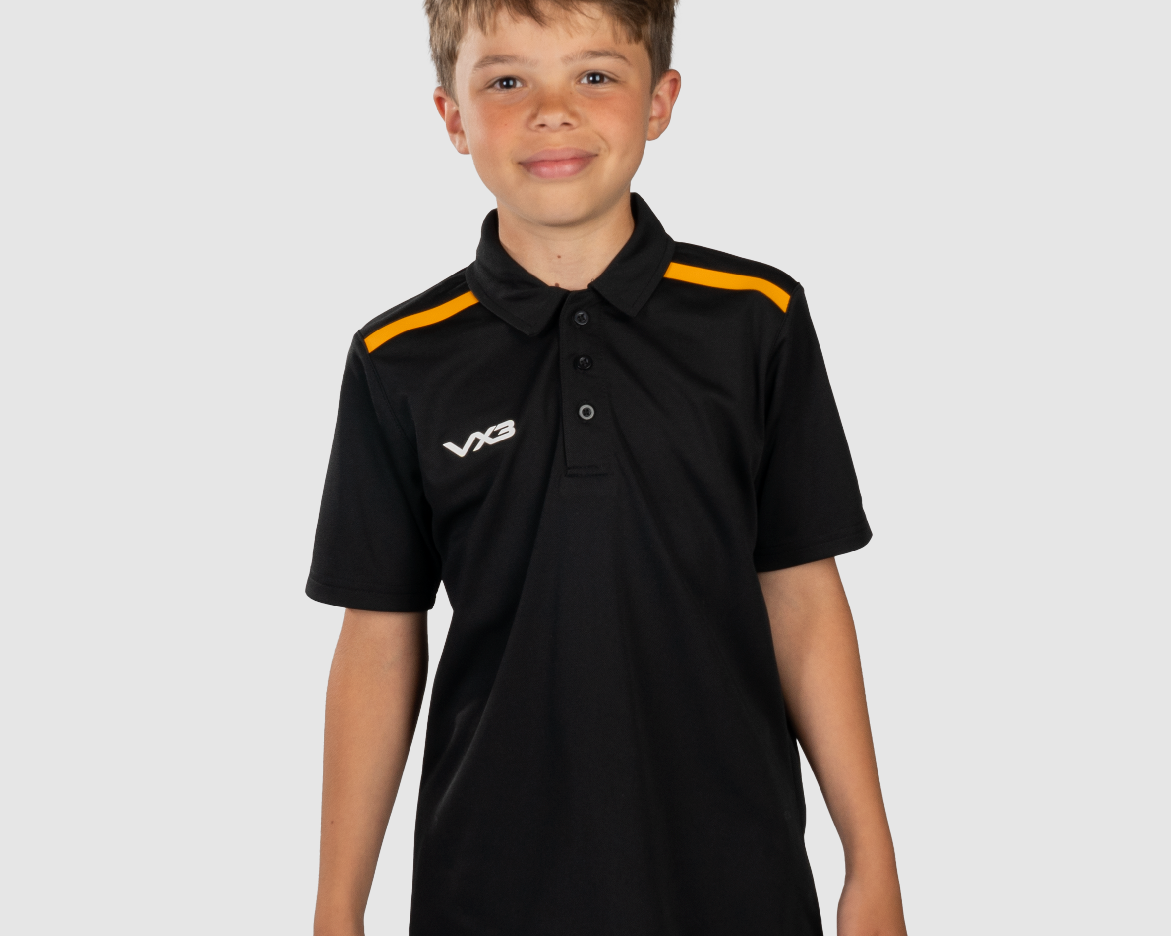 YouthFortisPoloBlackAmberFront.png