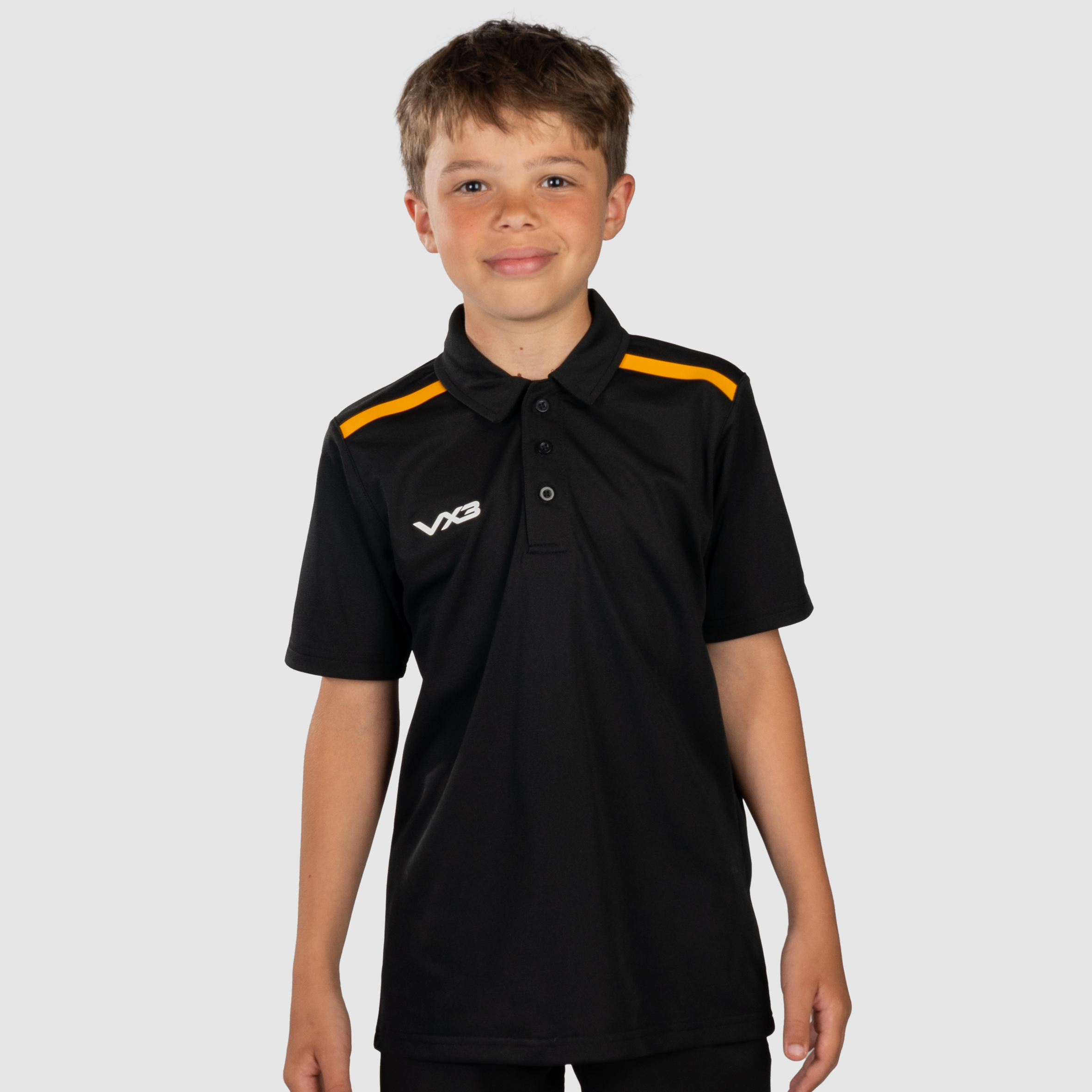 YouthFortisPoloBlackAmberFront.png