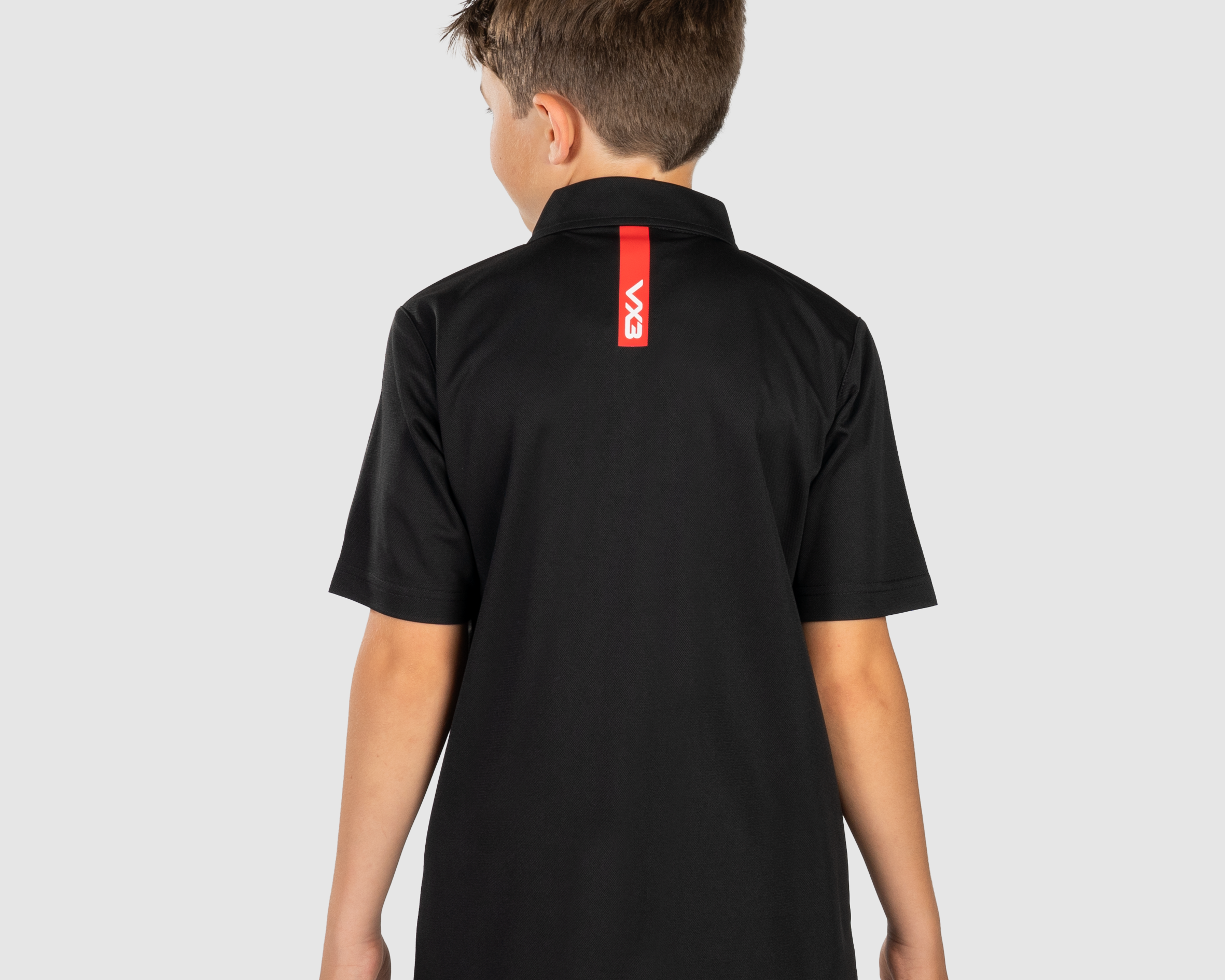 YouthFortisPoloBlackRedBack.png