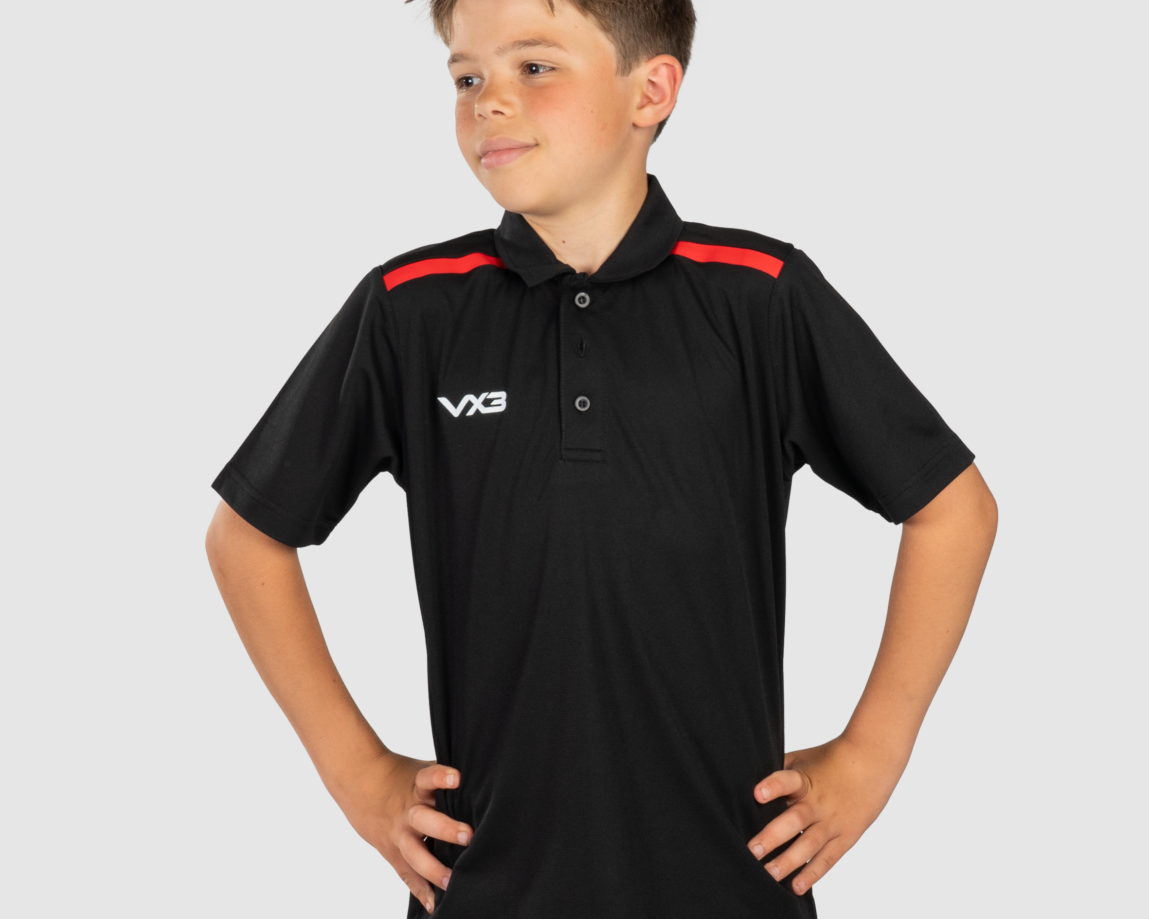 YouthFortisPoloBlackRedFront.png