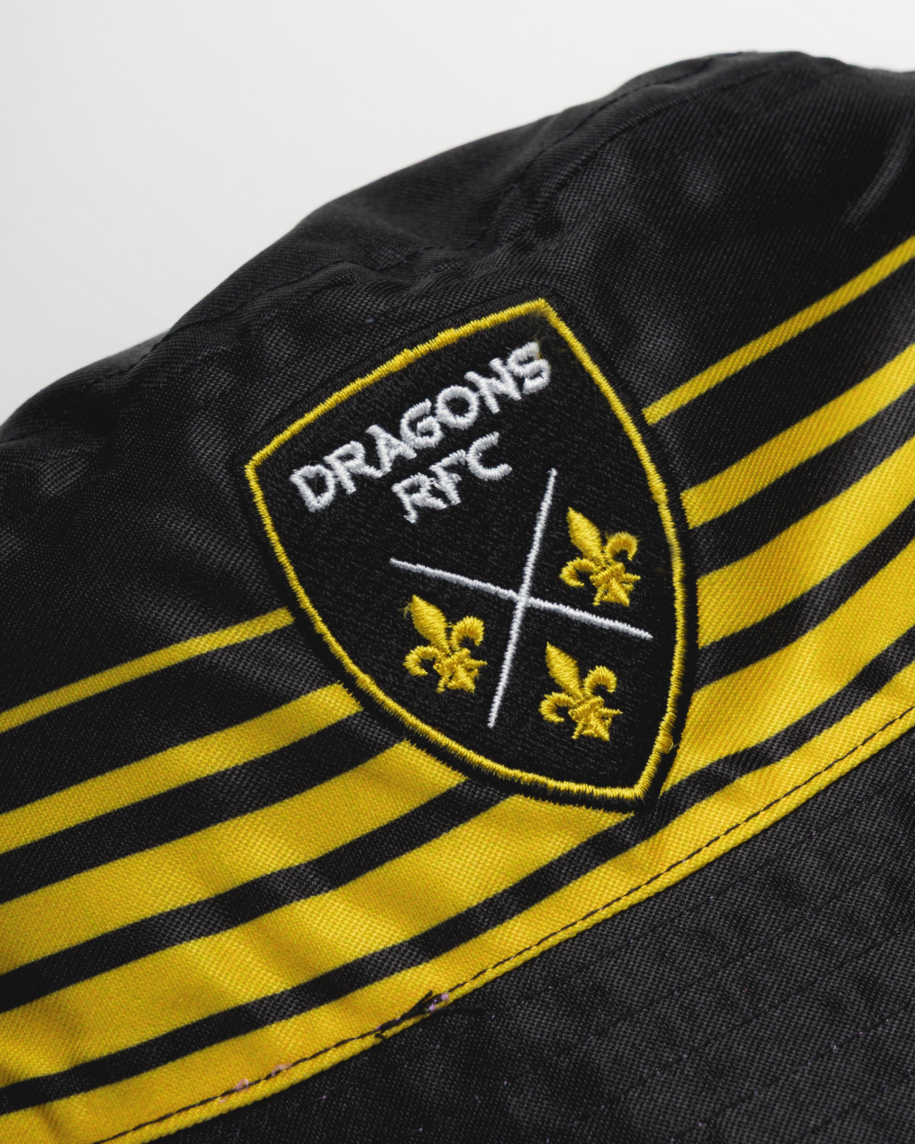 Dragons RFC 24/25  Reversible Bucket Hat - Black/Amber/Lavender